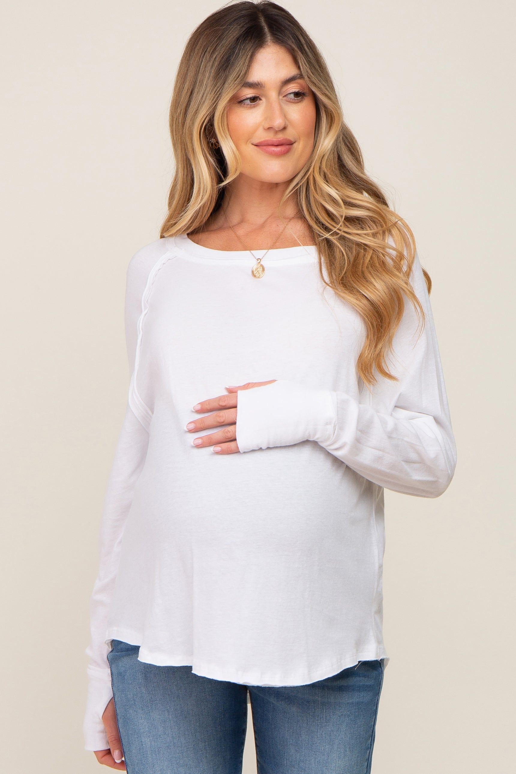 White Exposed Seam Long Sleeve Maternity Top sold by Pinkblush