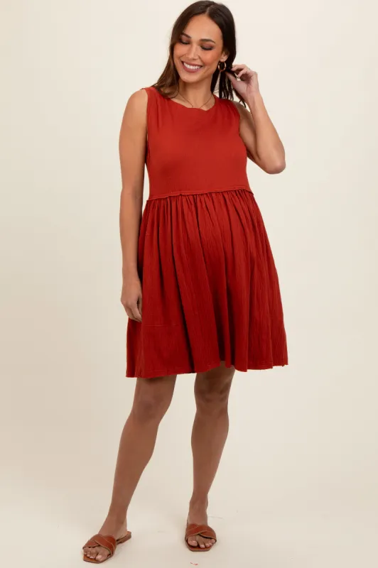 Rust Sleeveless Textured Maternity Dress sold by Pinkblush