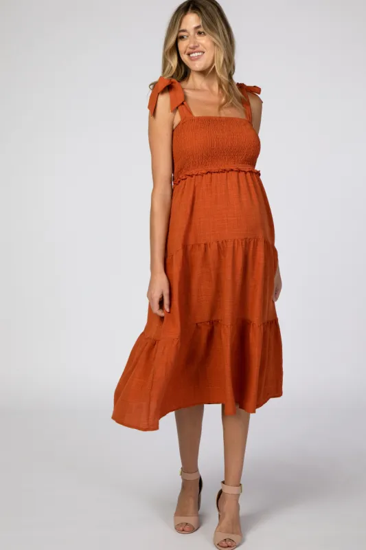 Rust Bow Strap Tiered Maternity Midi Dress sold by Pinkblush
