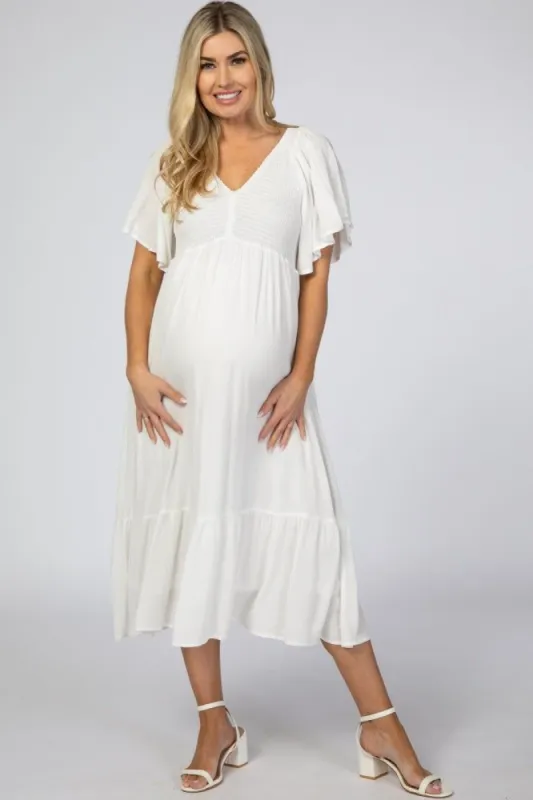 White Smocked Ruffle Maternity Dress sold by Pinkblush