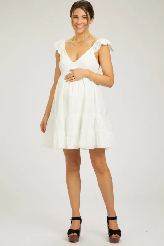 White Textured Polka Dot Eyelet Shoulder V-Neck Maternity Dress sold by Pinkblush
