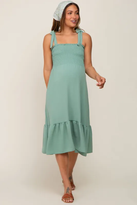 Sage Smocked Shoulder Tie Maternity Midi Dress sold by Pinkblush