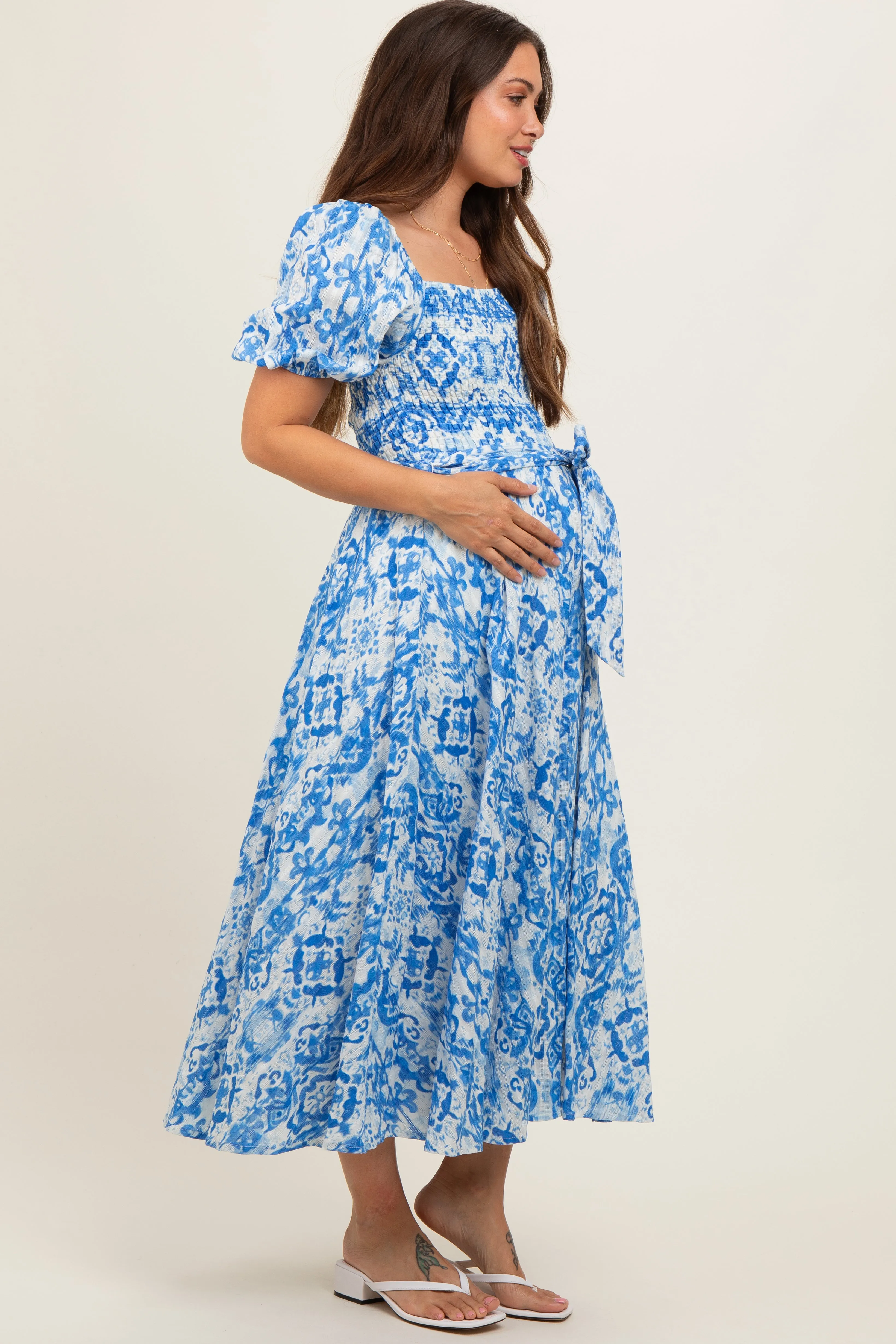Blue Floral Smocked Short Puff Sleeve Maternity Midi Dress sold by Pinkblush product image thumbnail 2