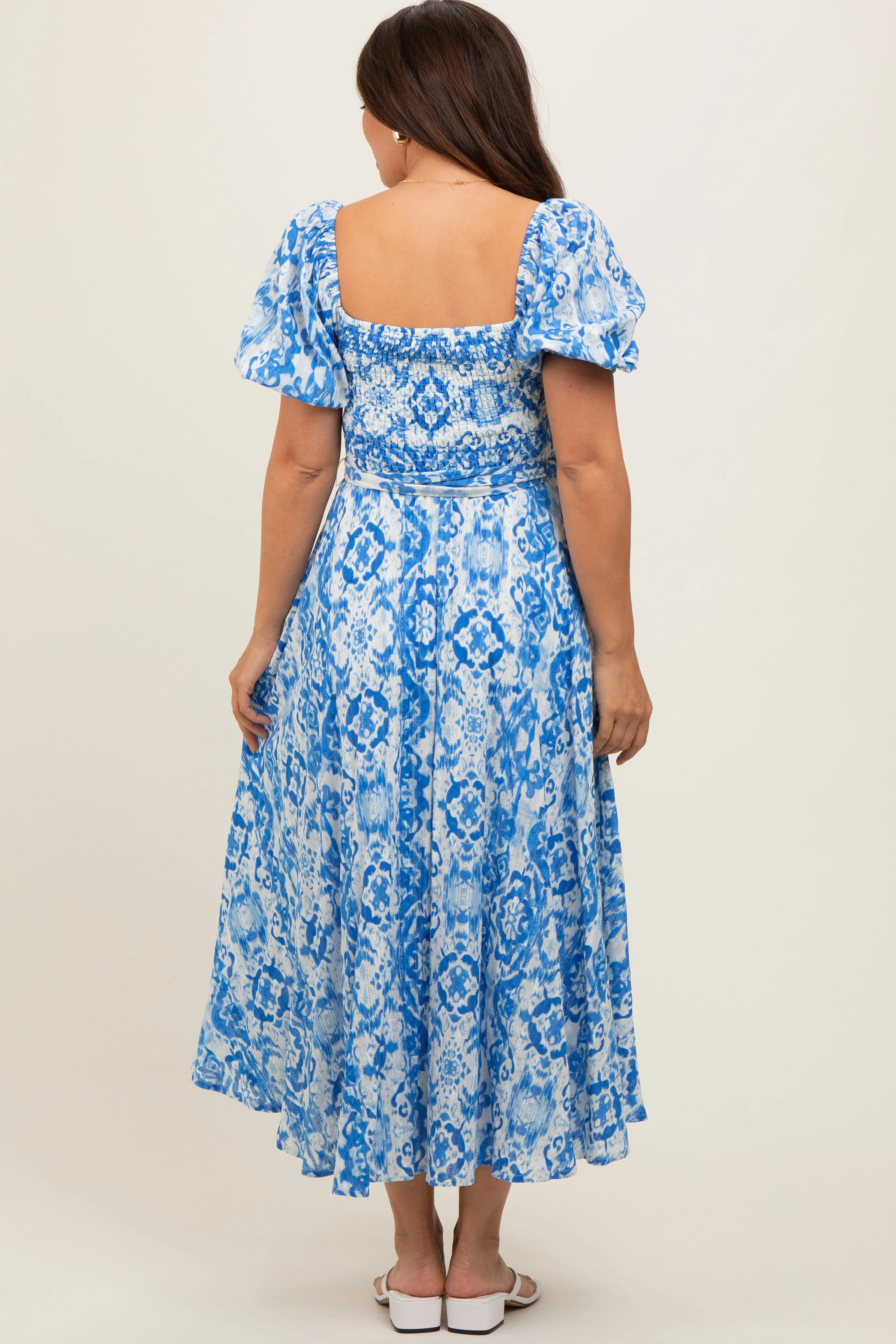 Blue Floral Smocked Short Puff Sleeve Maternity Midi Dress sold by Pinkblush product image thumbnail 3