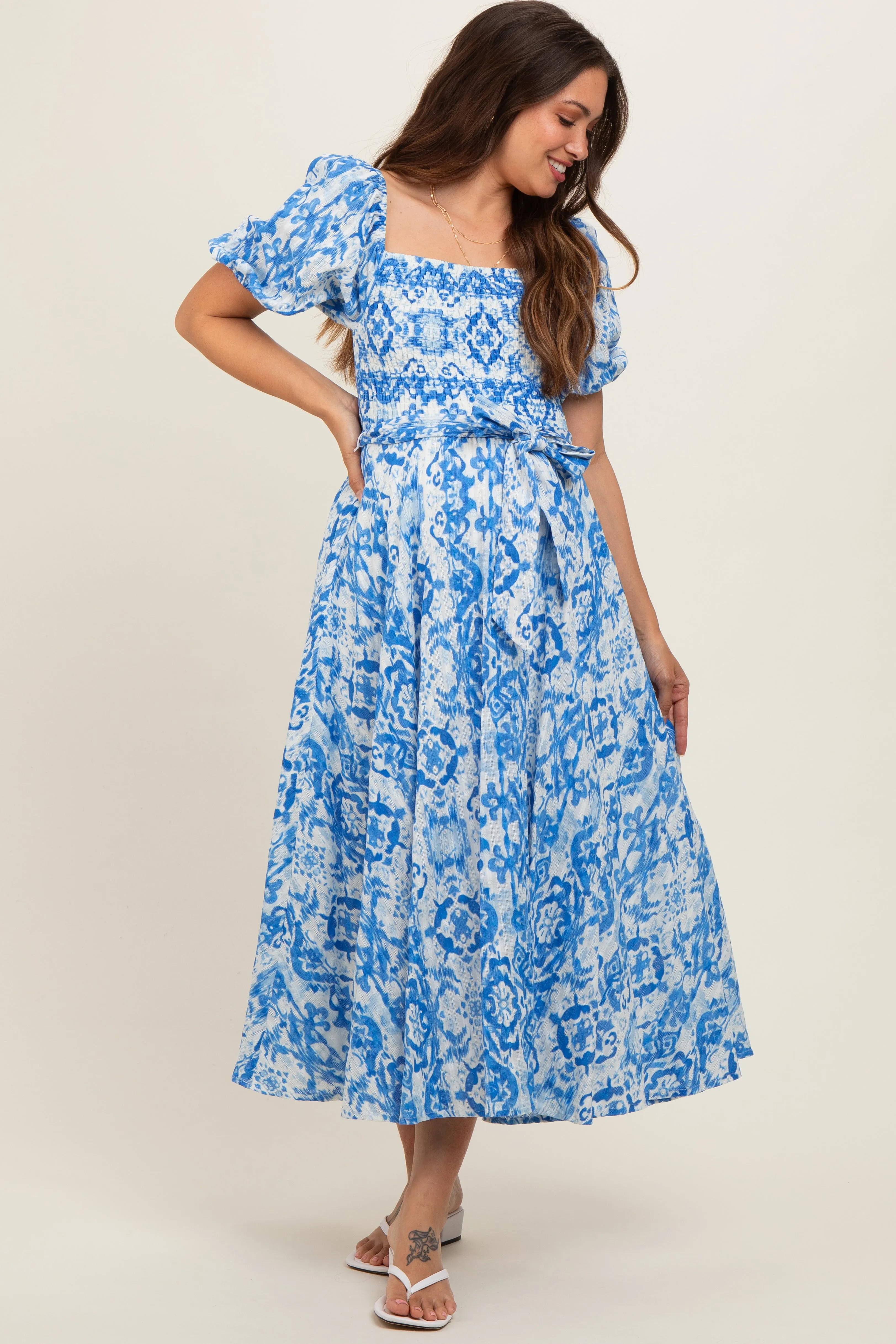 Blue Floral Smocked Short Puff Sleeve Maternity Midi Dress sold by Pinkblush