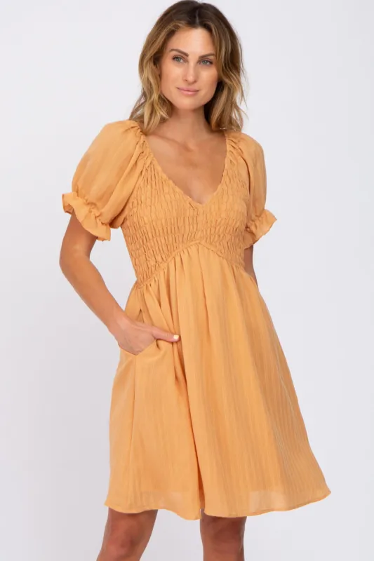 Peach Smocked Puff Sleeve Dress sold by Pinkblush