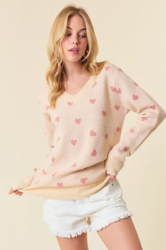 Cream Heart Print Knit Sweater sold by Pinkblush