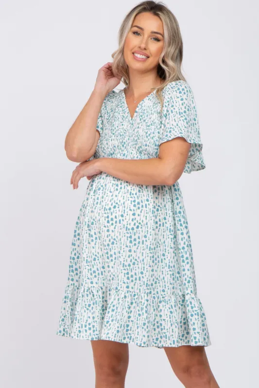 Teal Printed Smocked Maternity Dress sold by Pinkblush