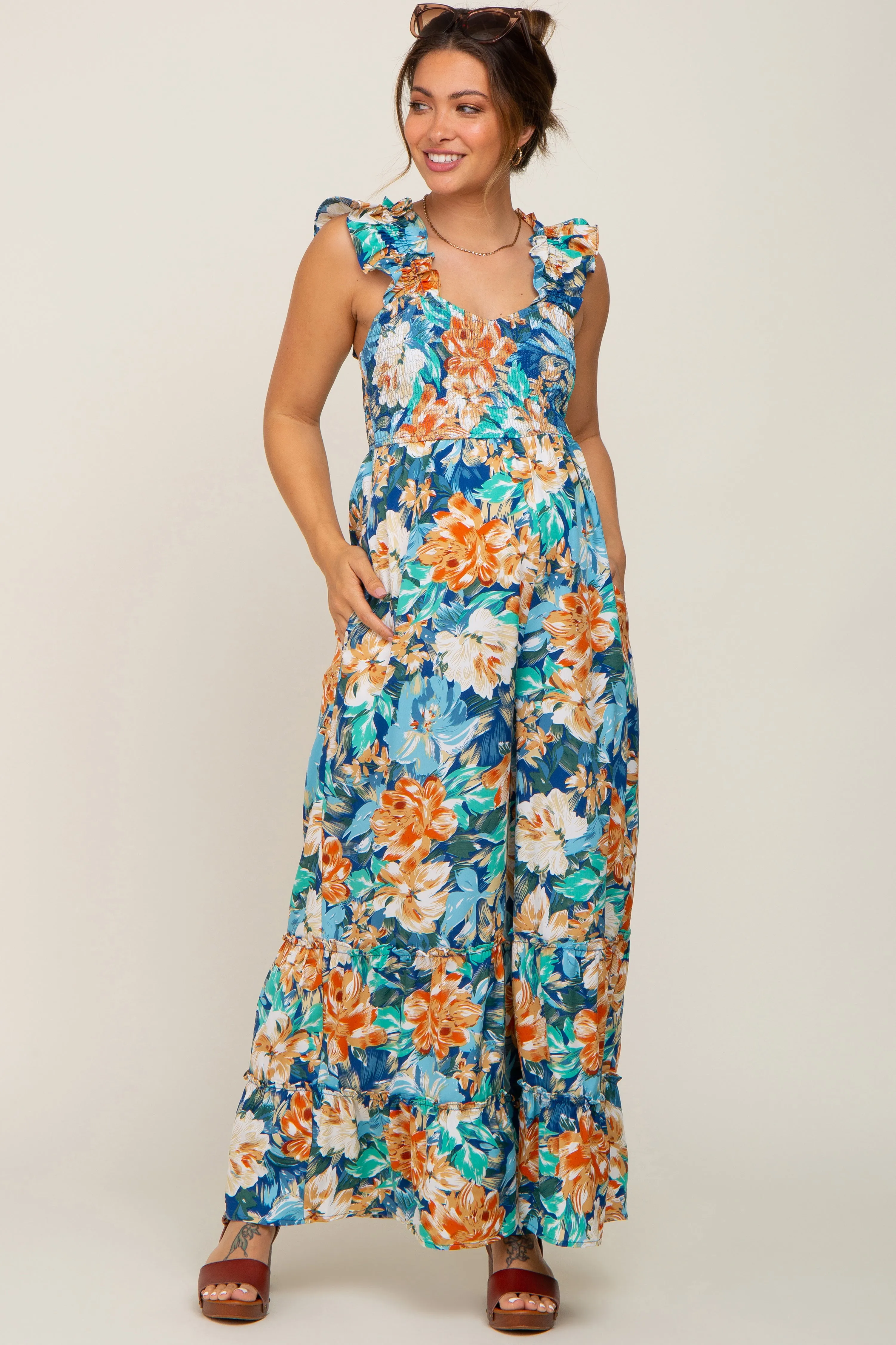 Navy Floral Smocked Ruffle Accent Maternity Jumpsuit sold by Pinkblush