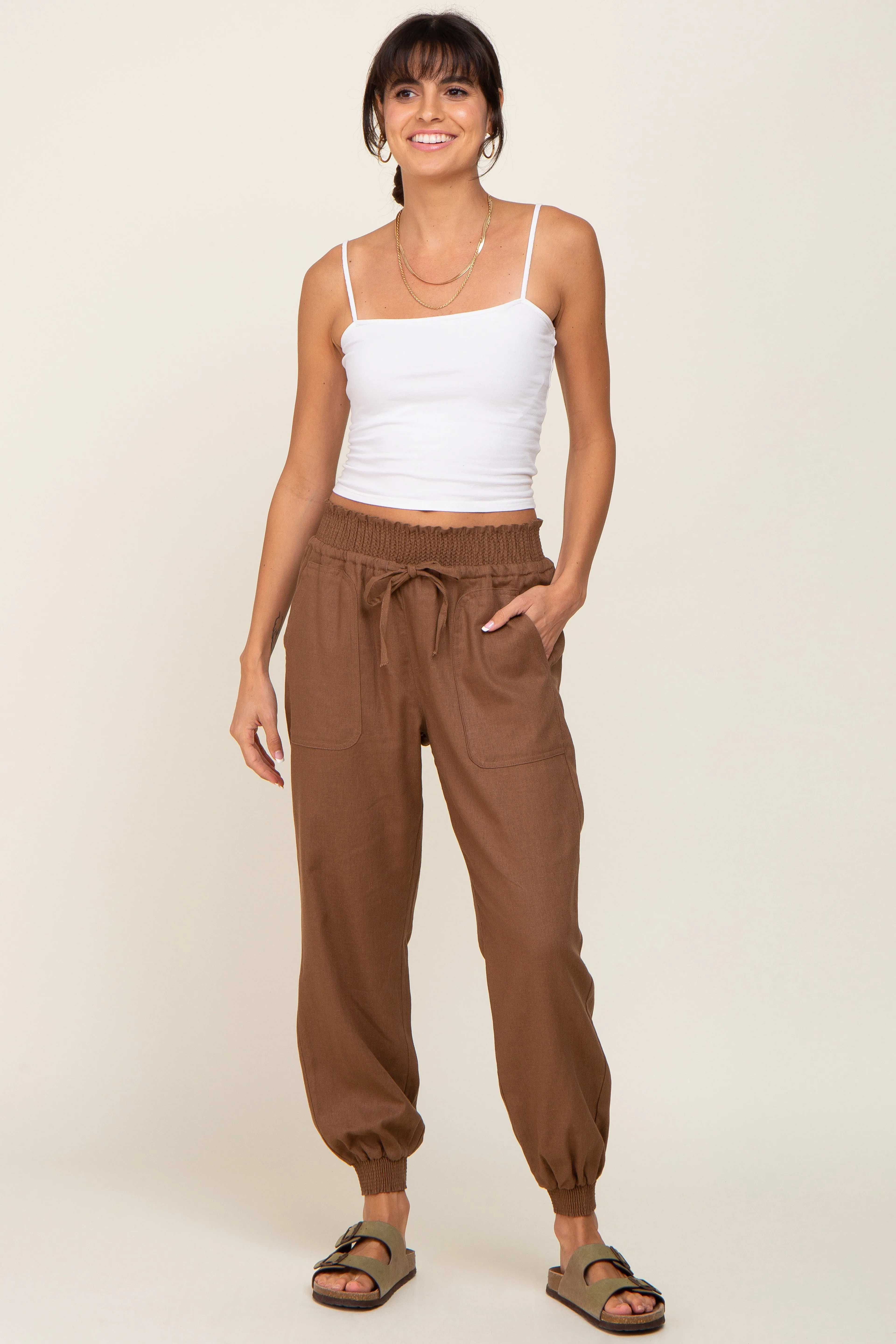 Brown Smocked Joggers sold by Pinkblush