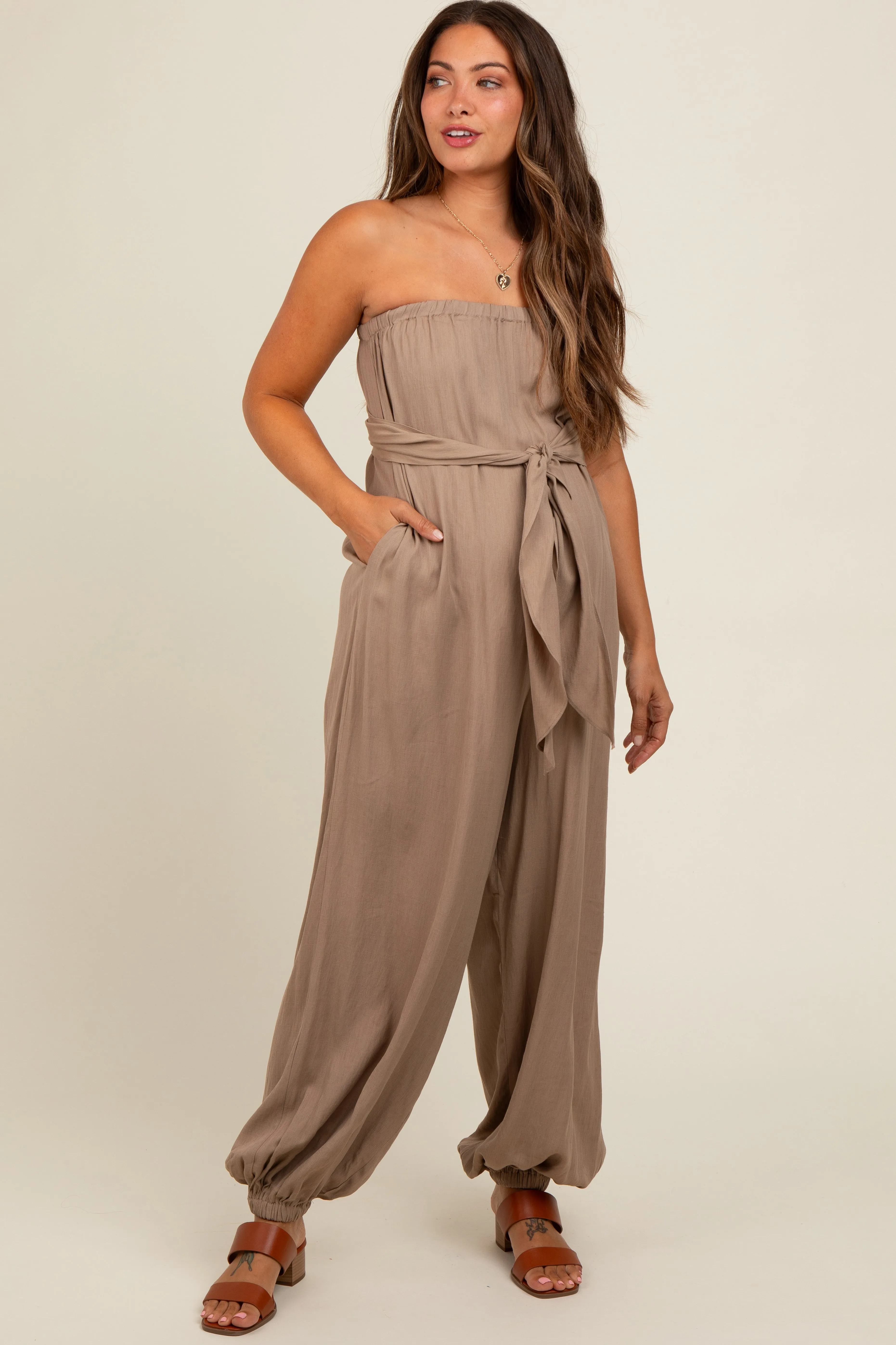 Mocha Strapless Sash Tie Maternity Jumpsuit sold by Pinkblush
