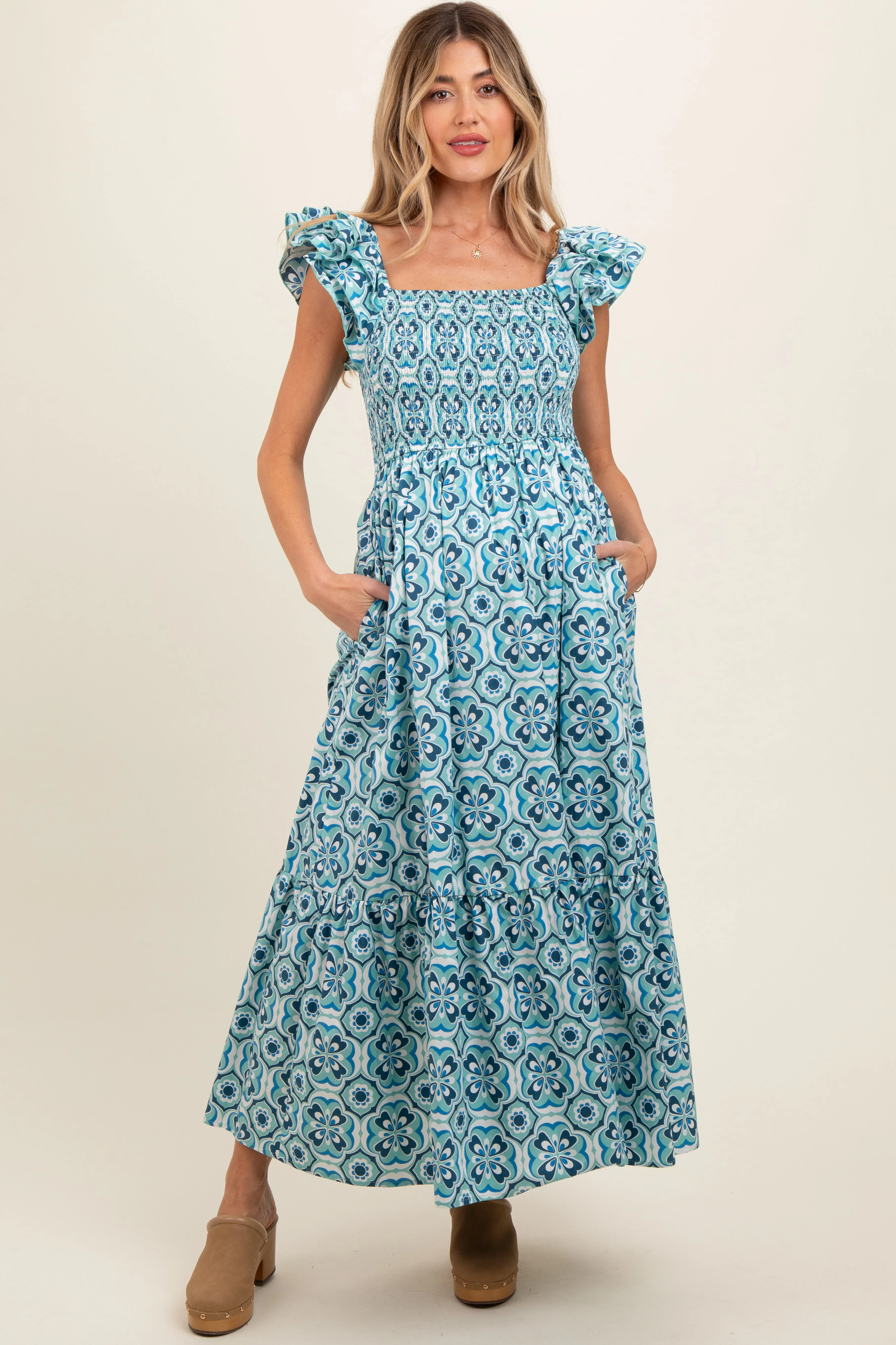 Blue Floral Smocked Flutter Cap Sleeve Maternity Maxi Dress sold by Pinkblush