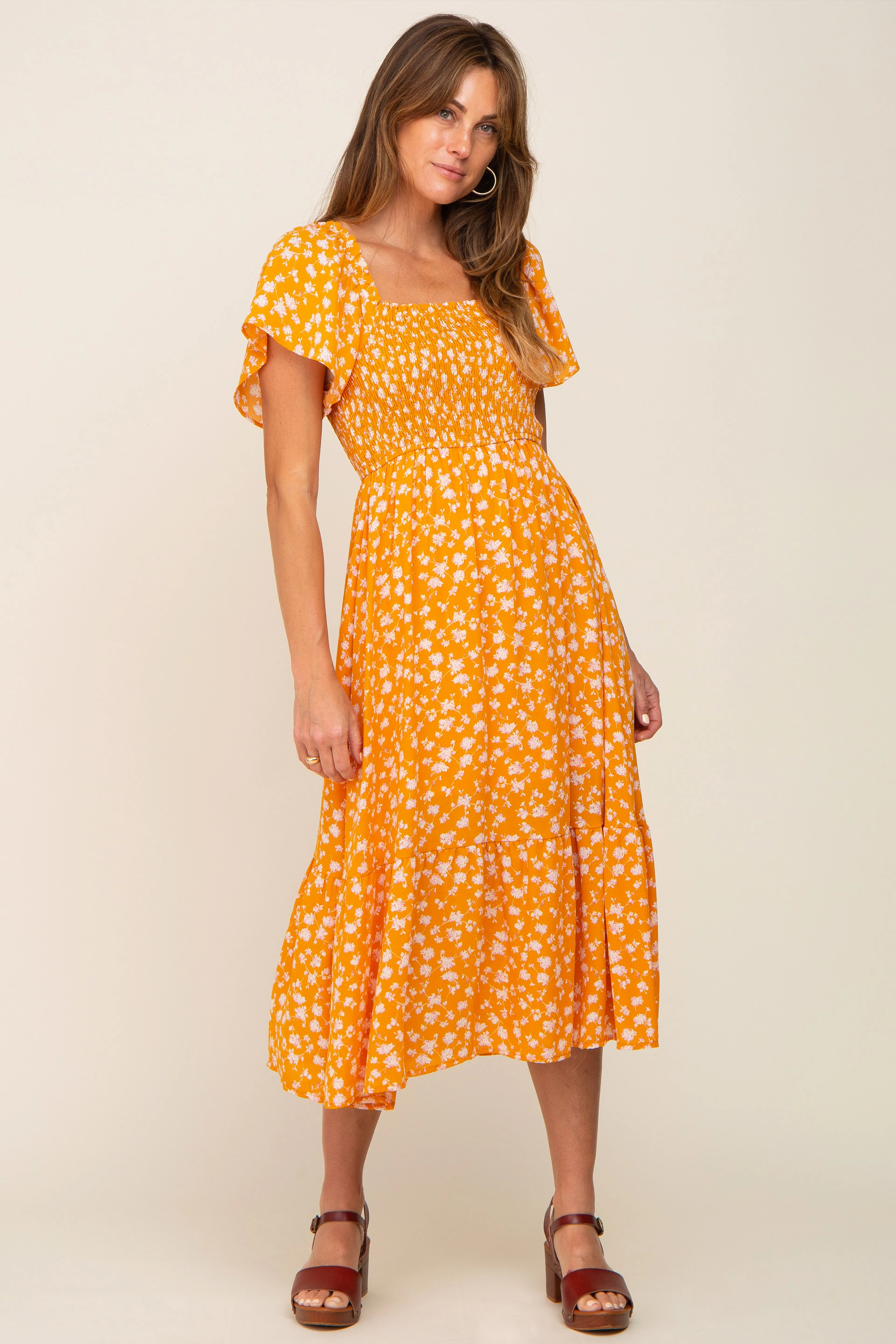 Yellow Floral Smocked Midi Dress sold by Pinkblush