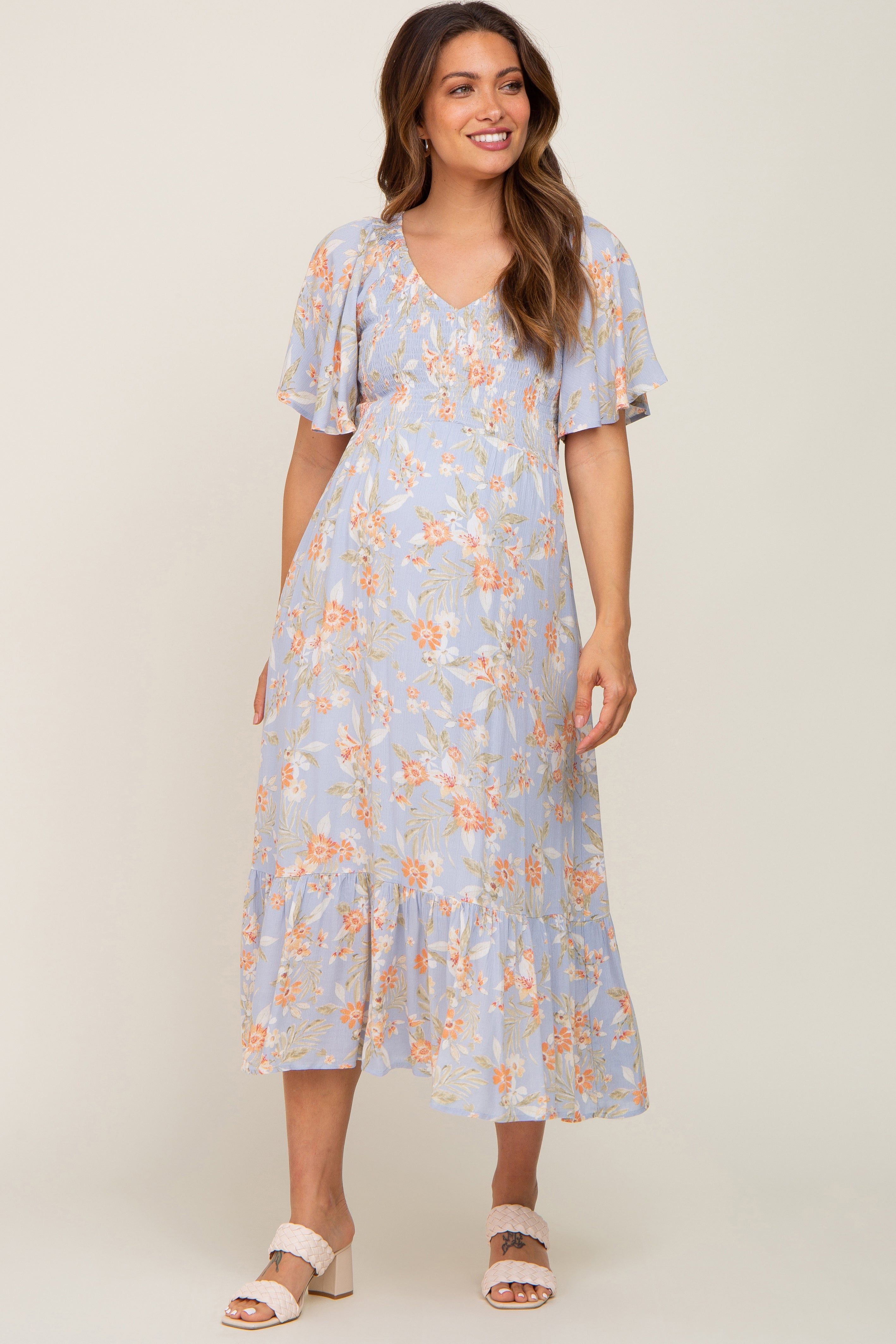 Light Blue Floral Smocked V-Neck Short Sleeve Maternity Midi Dress sold by Pinkblush