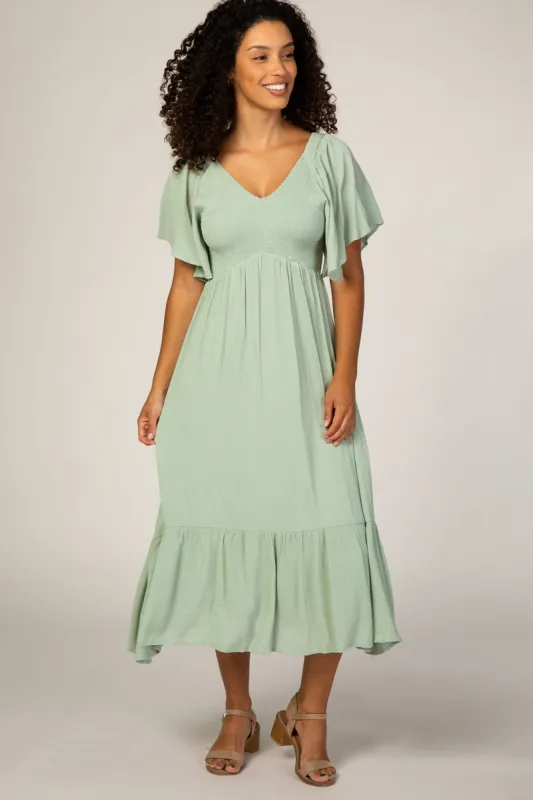 Mint Smocked Ruffle Dress sold by Pinkblush