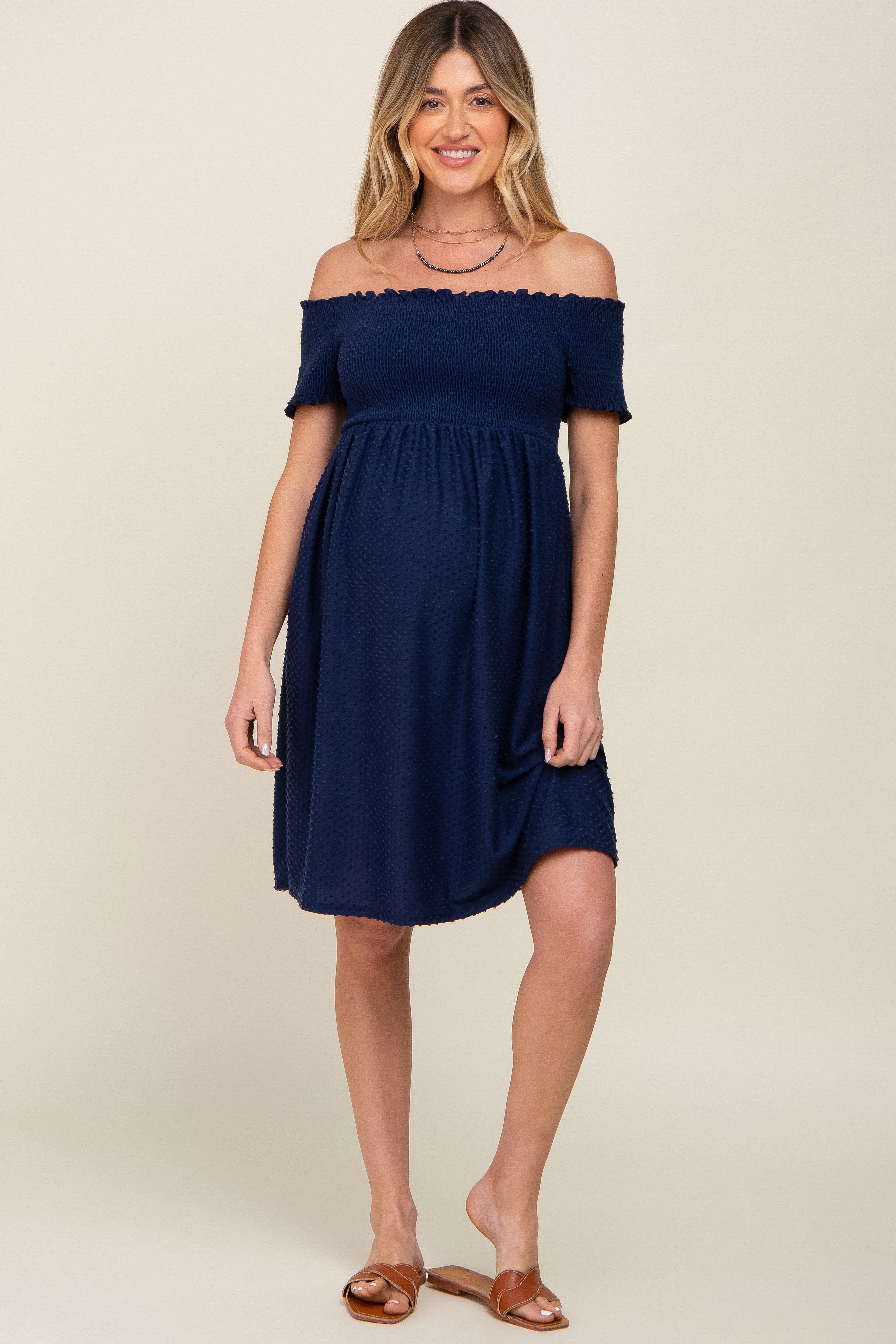 Navy Swiss Dot Off Shoulder Maternity Dress sold by Pinkblush