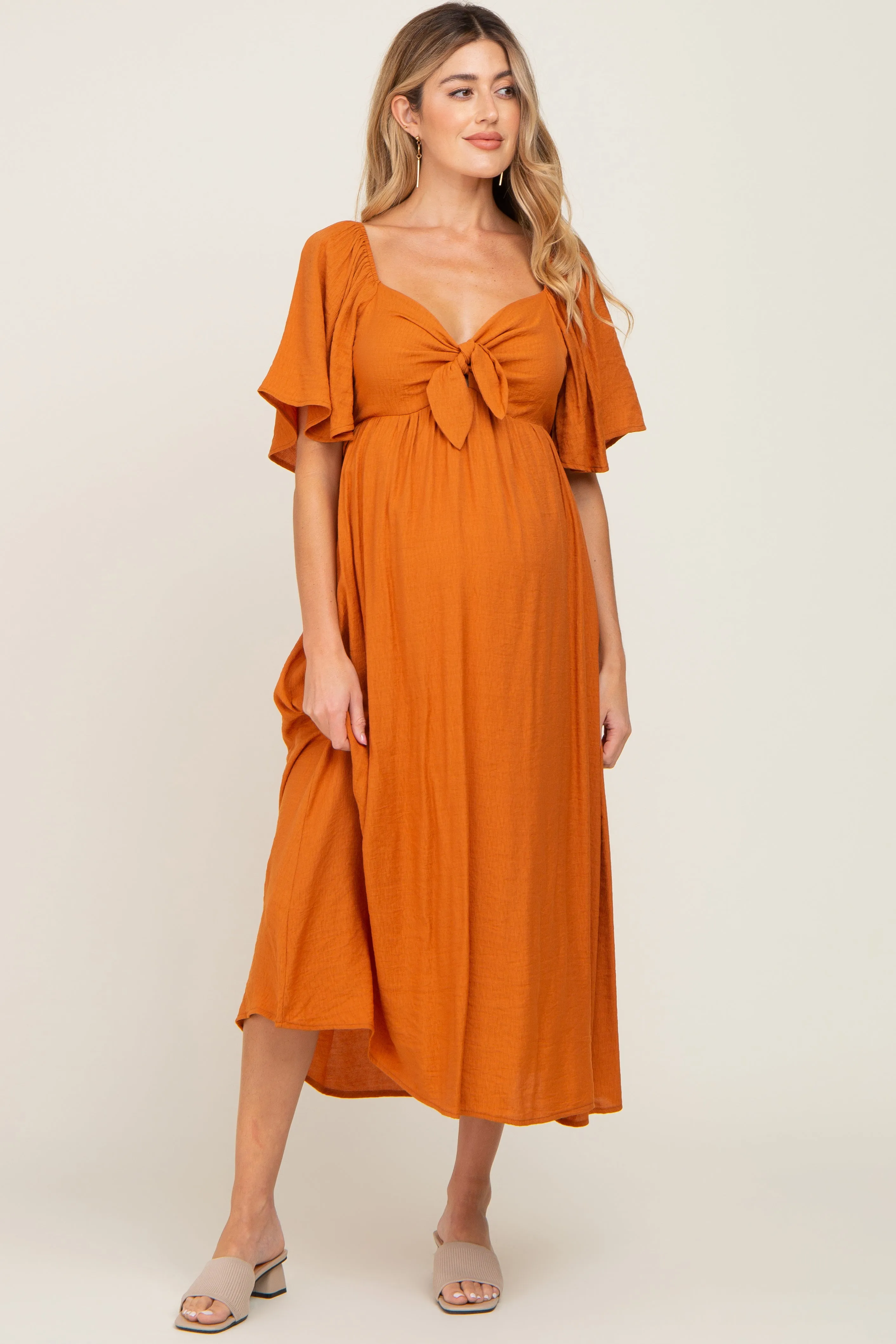 Rust Front Tie Ruffle Sleeve Maternity Midi Dress sold by Pinkblush