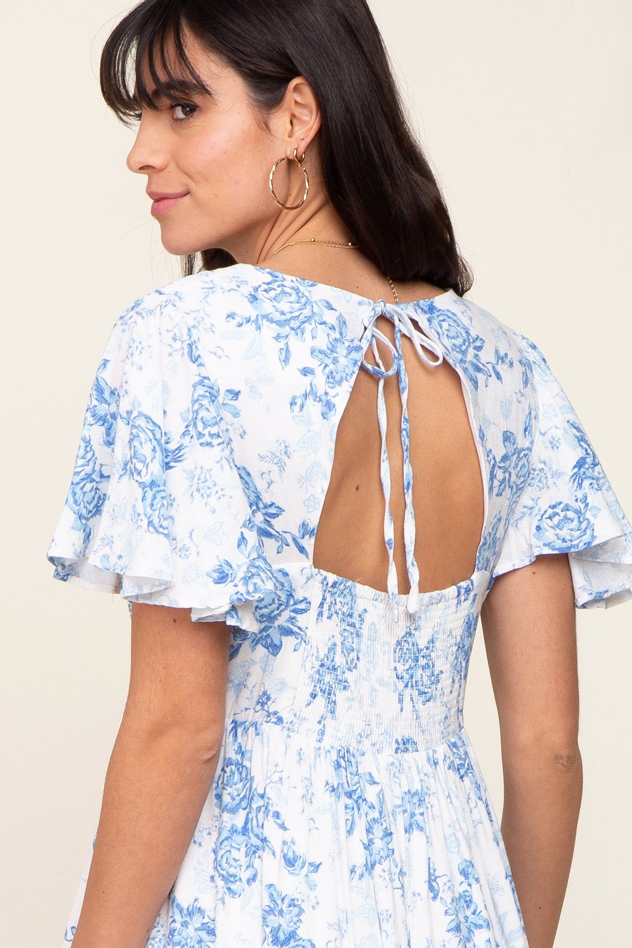 White Floral Short Flutter Sleeve Back Cutout Midi Dress sold by Pinkblush product image thumbnail 4
