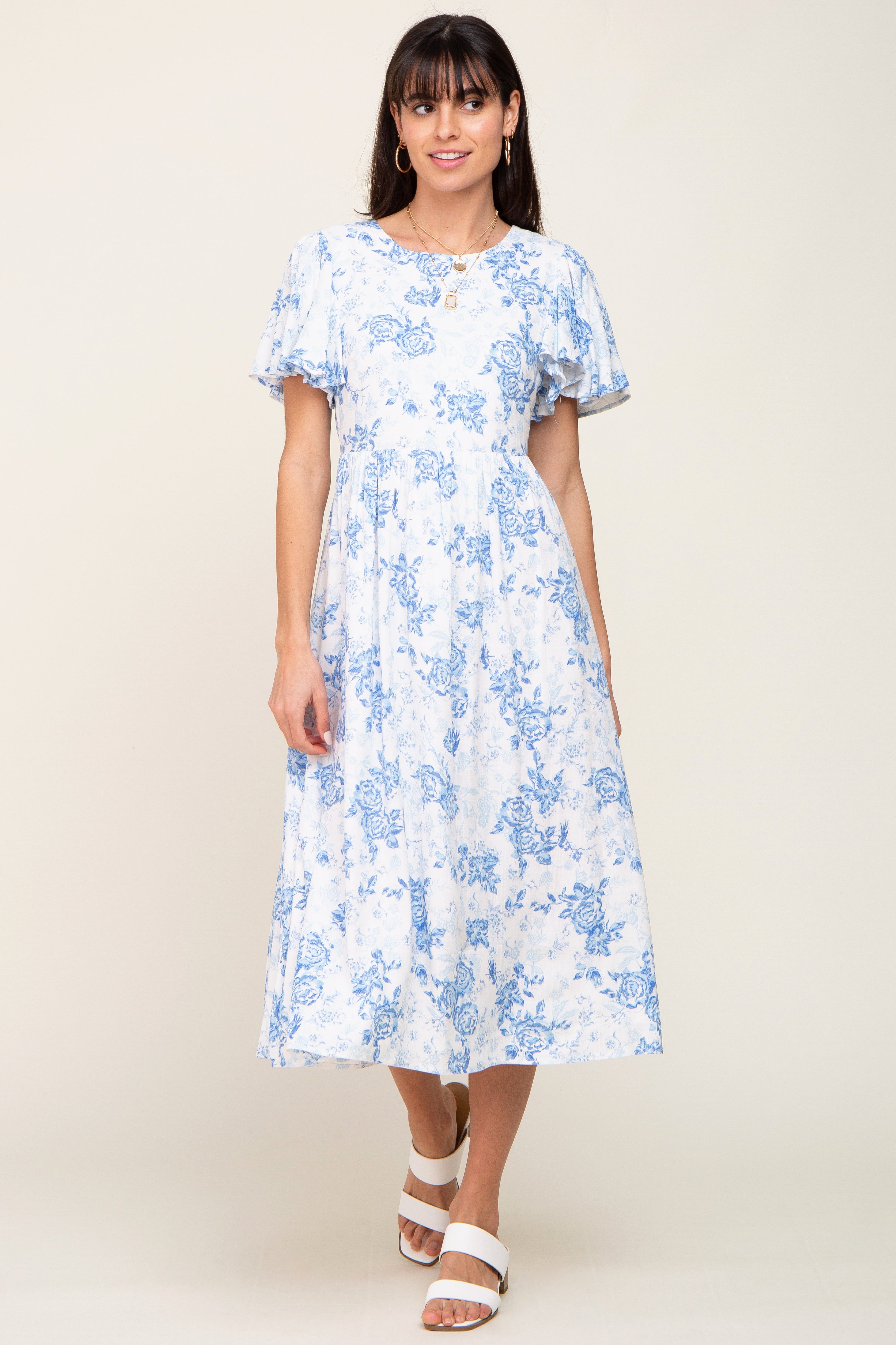 White Floral Short Flutter Sleeve Back Cutout Midi Dress sold by Pinkblush
