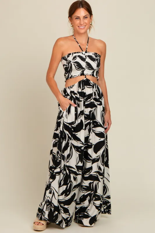 Black Tropical Print Cutout Smocked Jumpsuit sold by Pinkblush