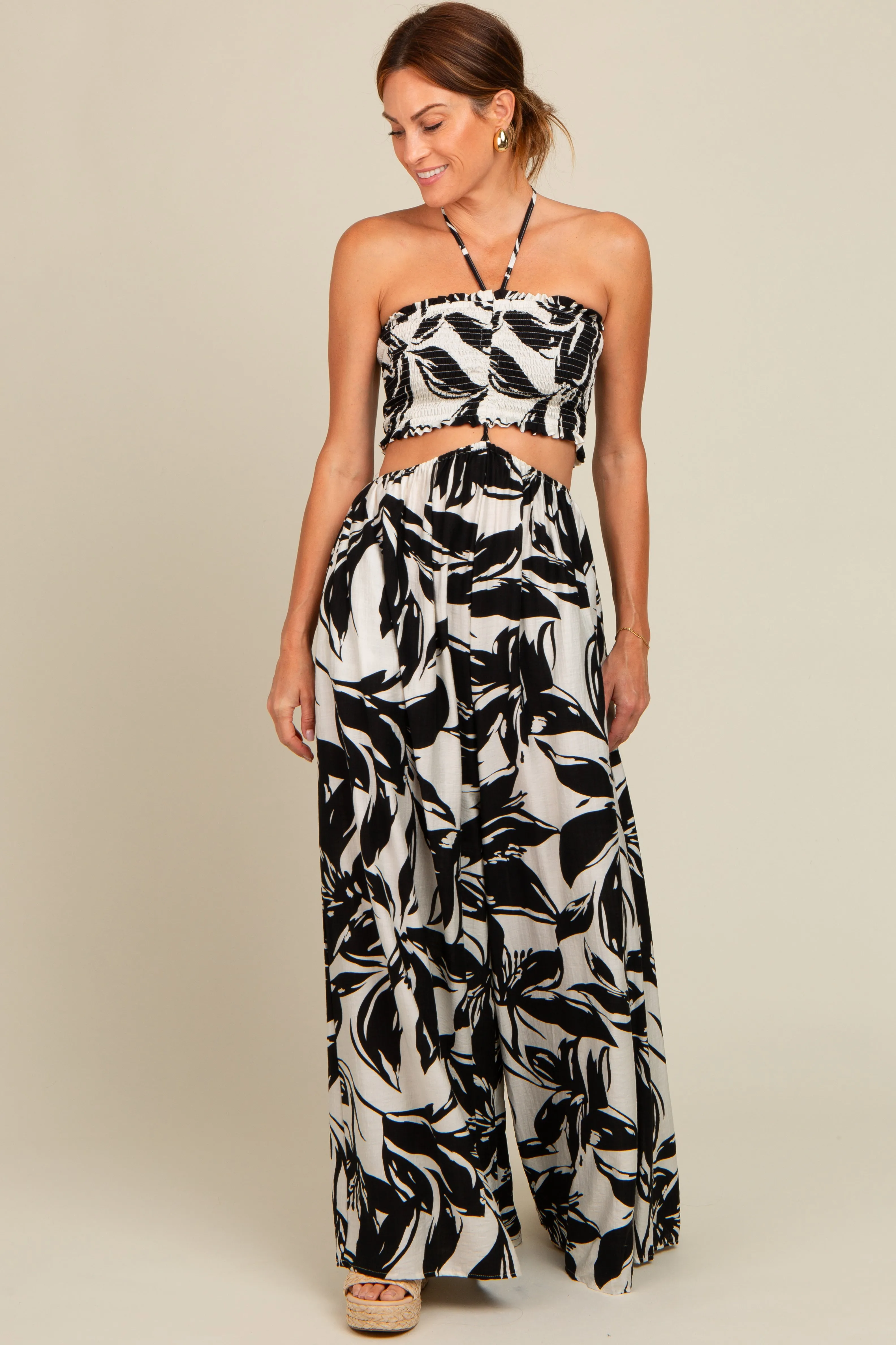 Black Tropical Print Cutout Smocked Jumpsuit sold by Pinkblush product image thumbnail 2