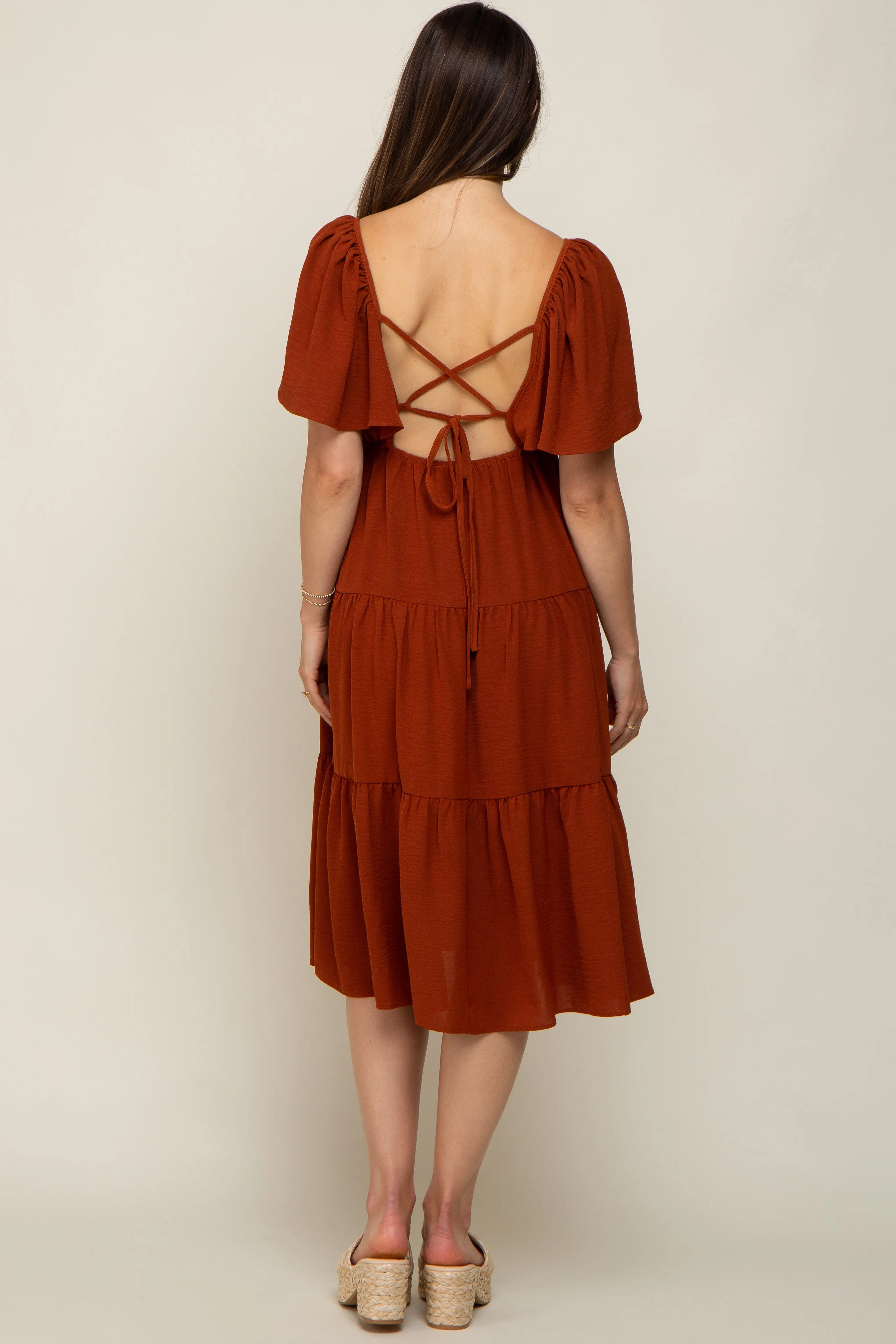 Rust Tiered Criss Cross Back Maternity Midi Dress sold by Pinkblush product image thumbnail 4