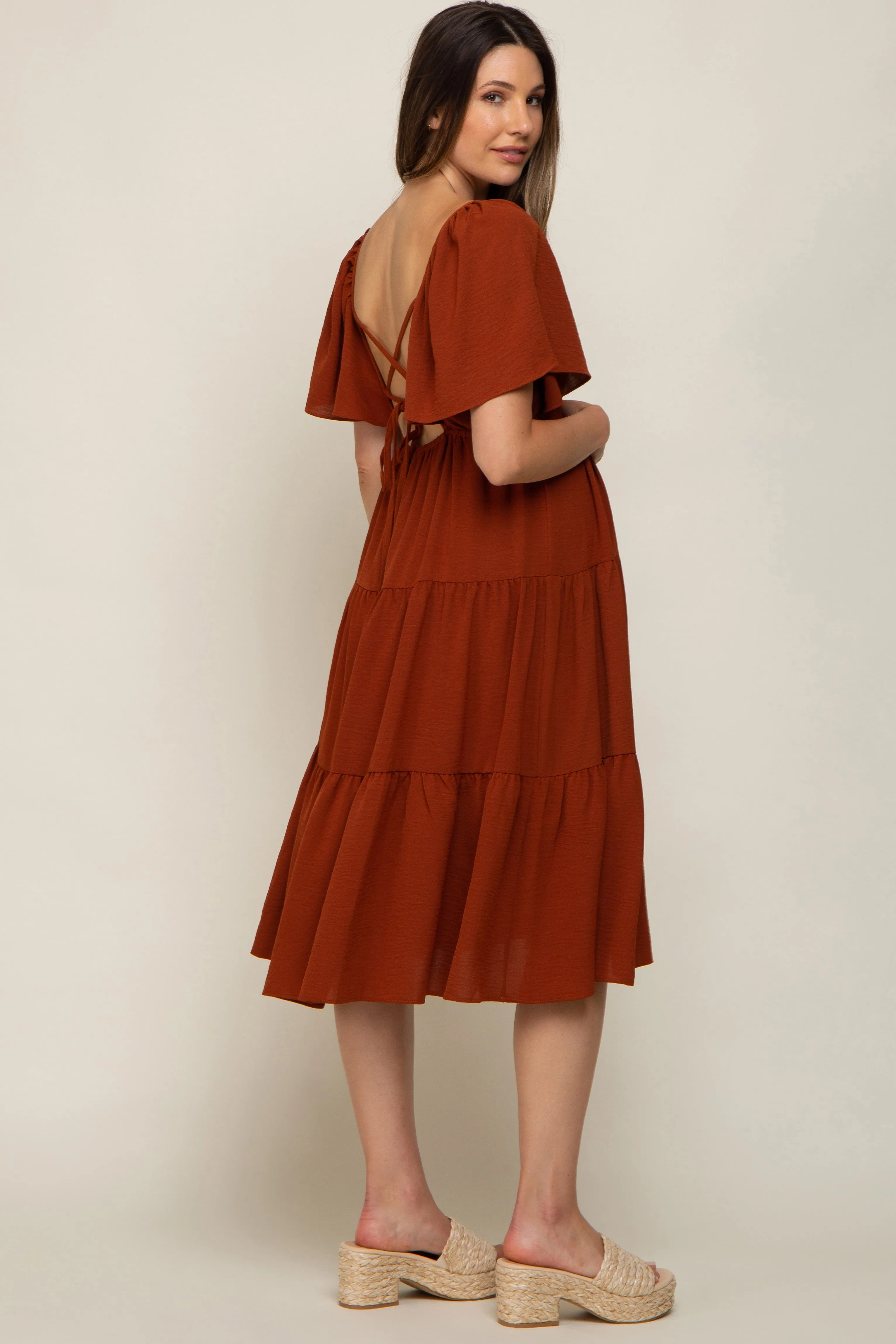 Rust Tiered Criss Cross Back Maternity Midi Dress sold by Pinkblush product image thumbnail 2