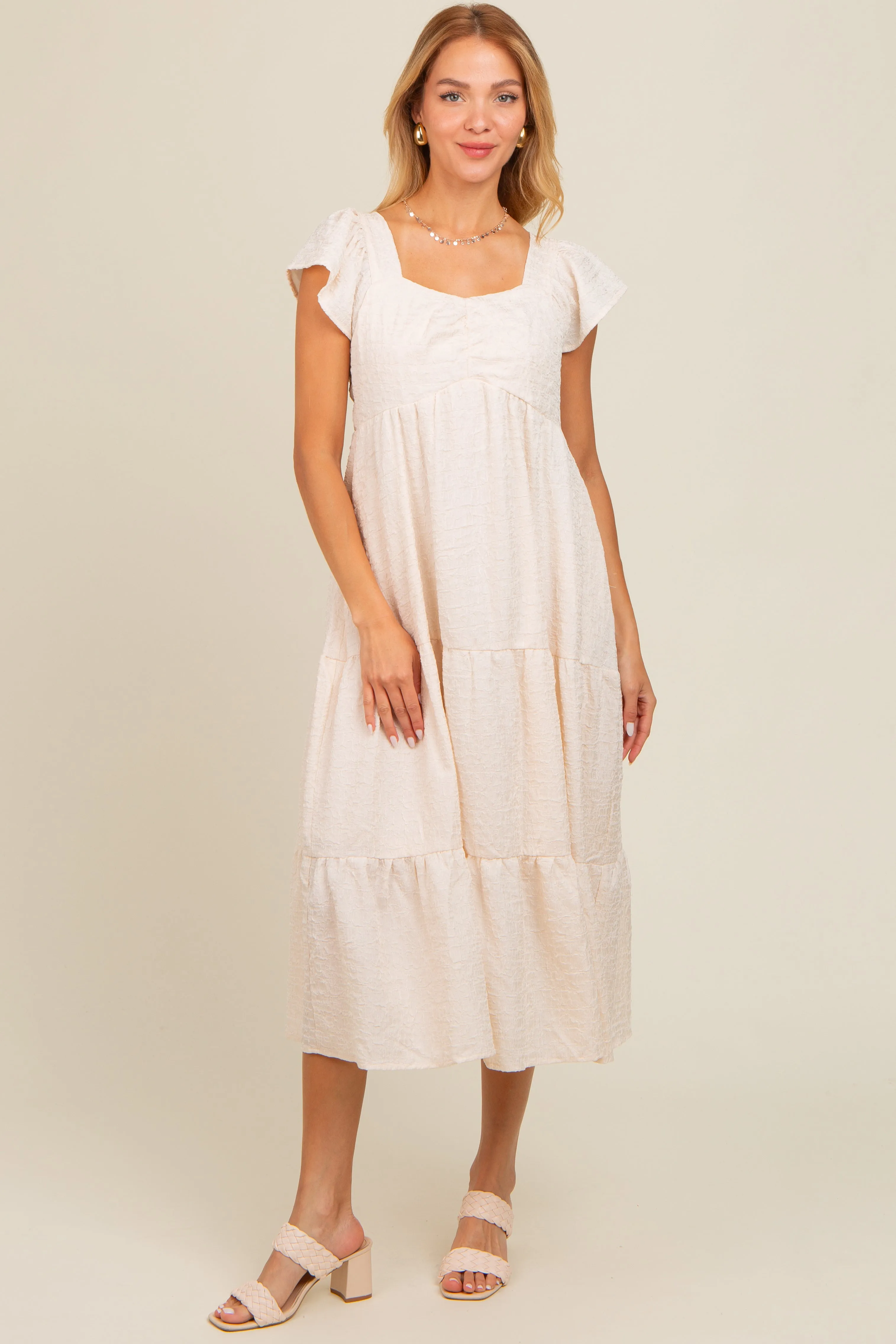 Ivory Textured Sweetheart Neck Short Puff Sleeve Tiered Midi Dress sold by Pinkblush product image thumbnail 2
