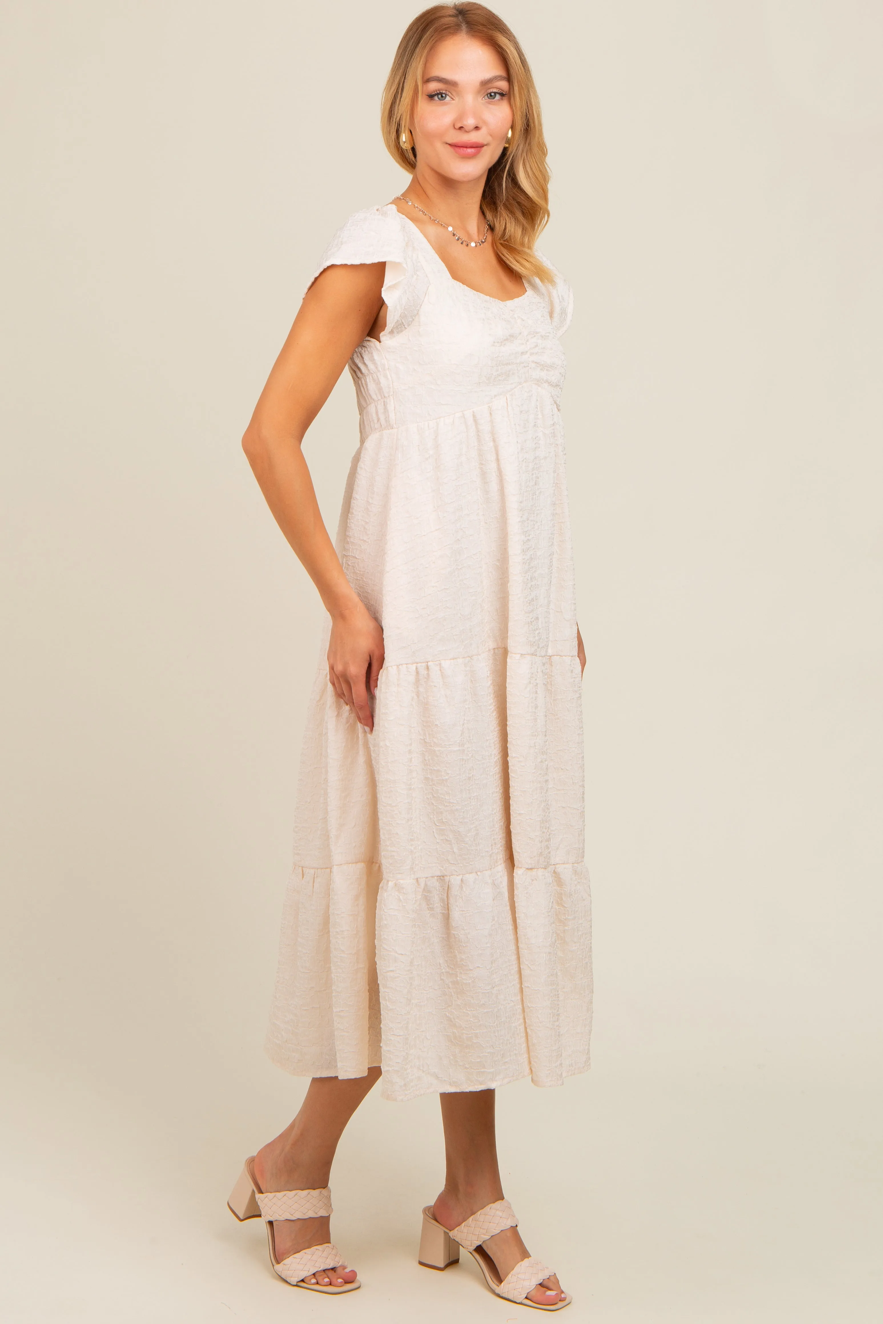 Ivory Textured Sweetheart Neck Short Puff Sleeve Tiered Midi Dress sold by Pinkblush product image thumbnail 3
