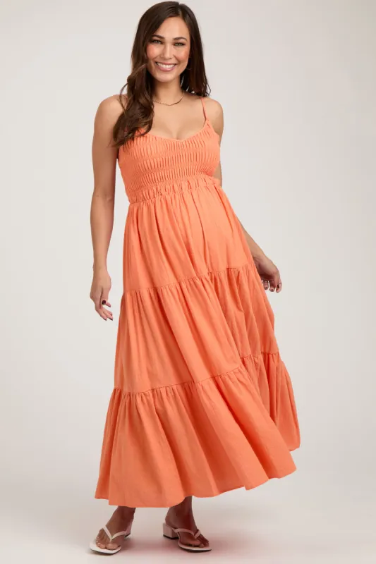 Orange Smocked V-Neck Sleeveless Tiered Maternity Midi Dress sold by Pinkblush