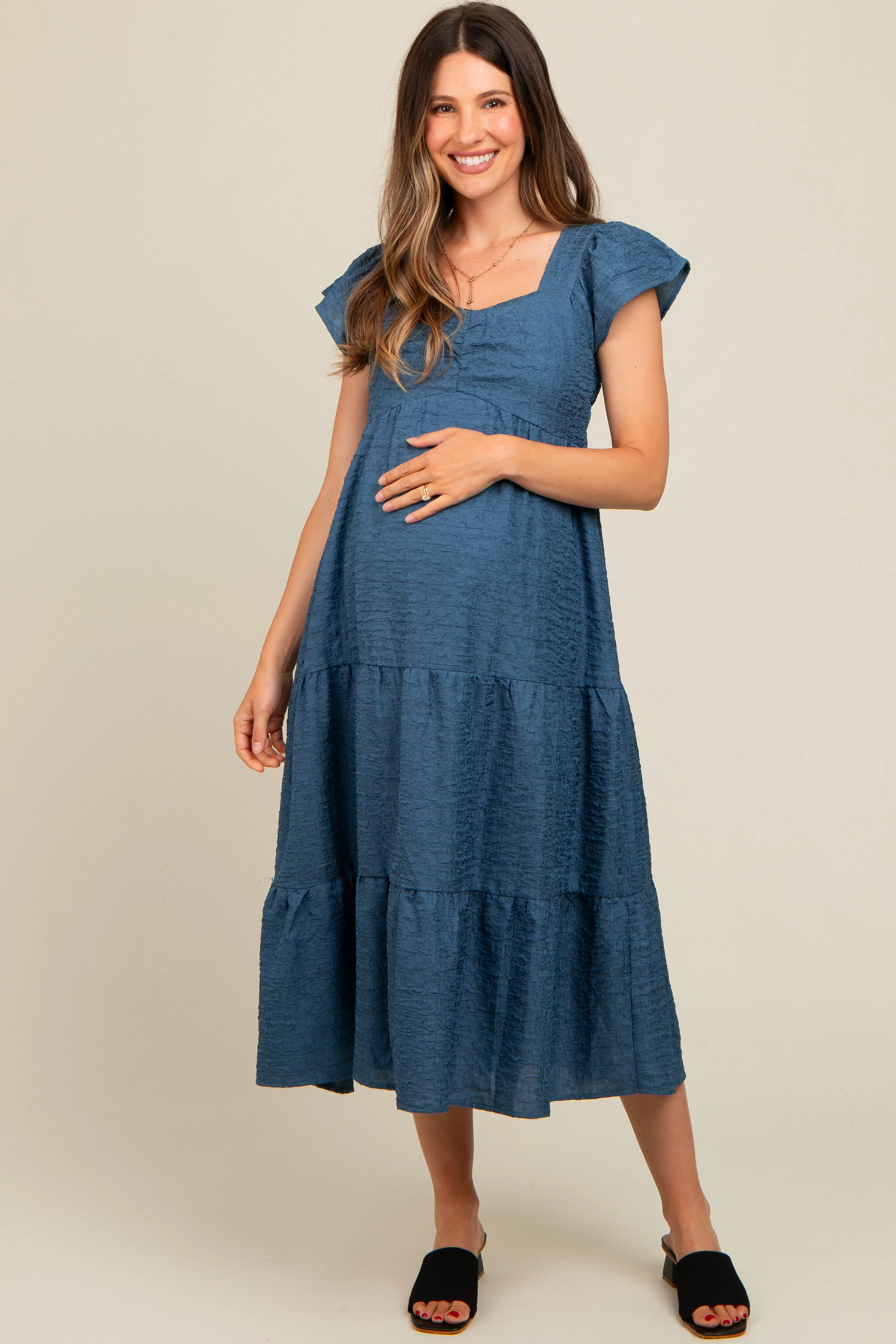 Blue Textured Sweetheart Neck Short Puff Sleeve Tiered Maternity Midi Dress sold by Pinkblush