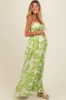 Lime Tropical Print Cutout Smocked Maternity Jumpsuit sold by Pinkblush