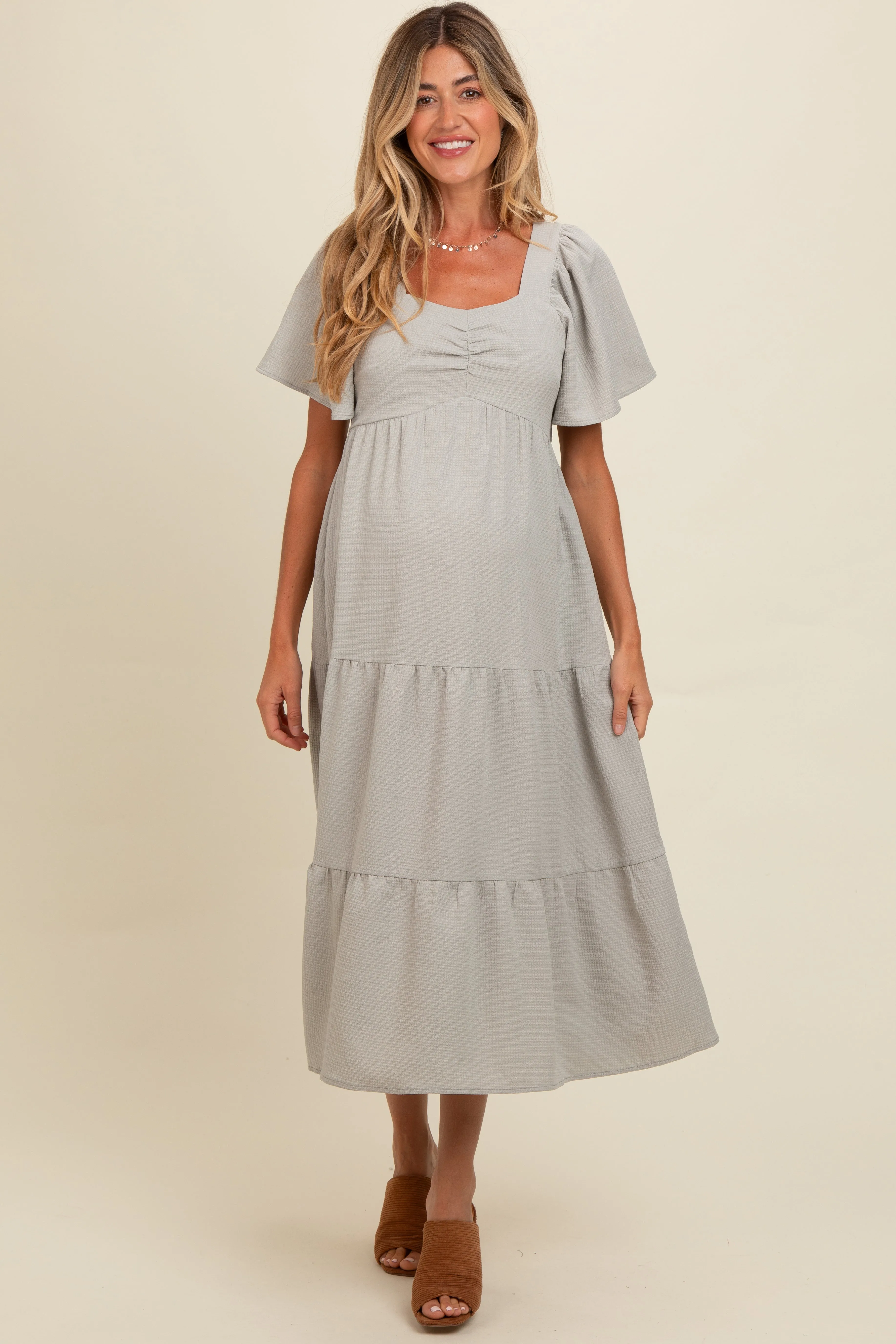 Light Olive Sweetheart Neck Short Puff Sleeve Tiered Maternity Midi Dress sold by Pinkblush