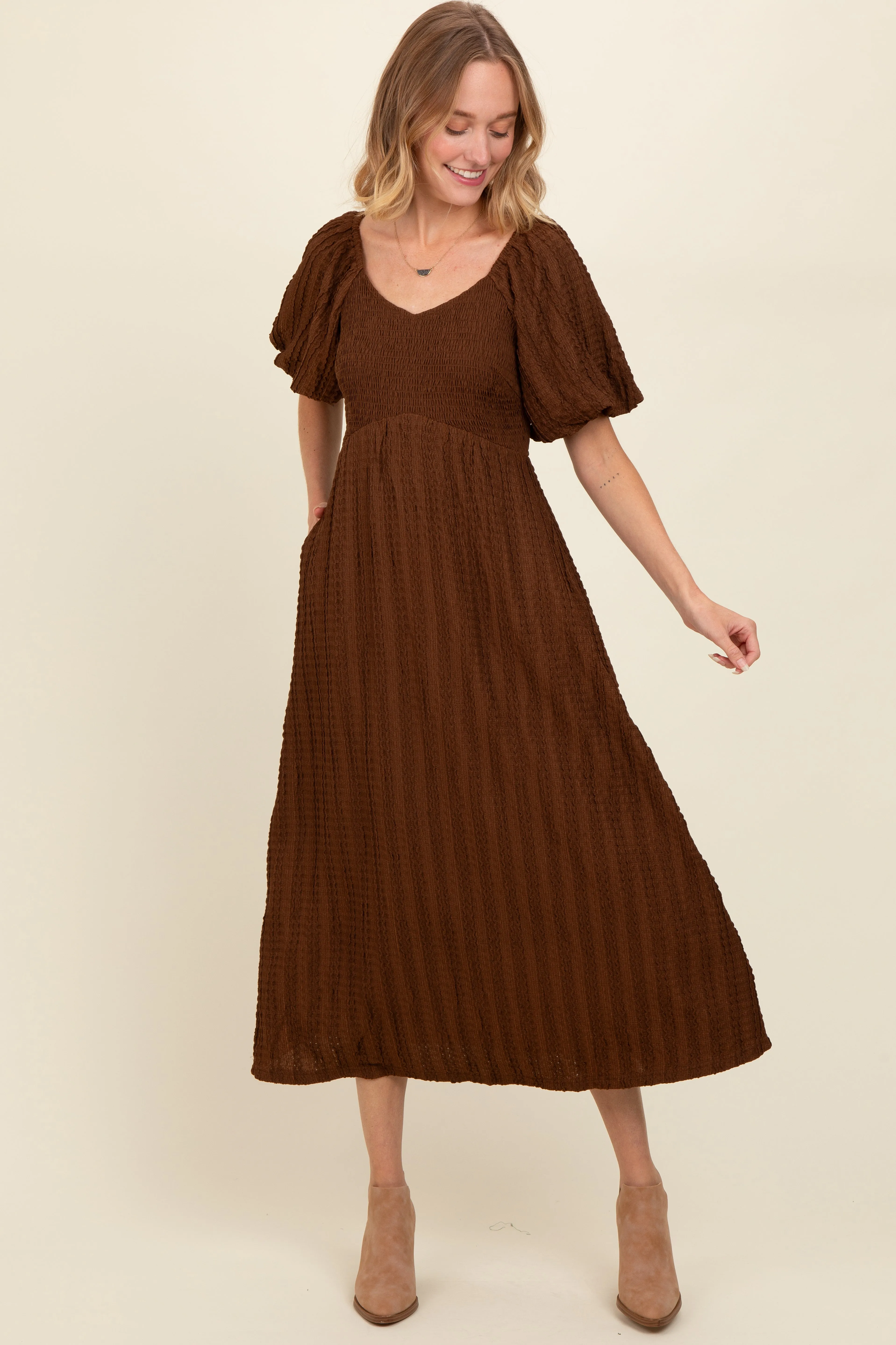 Brown Smocked V-Neck Short Puff Sleeve Textured Midi Dress sold by Pinkblush product image thumbnail 2