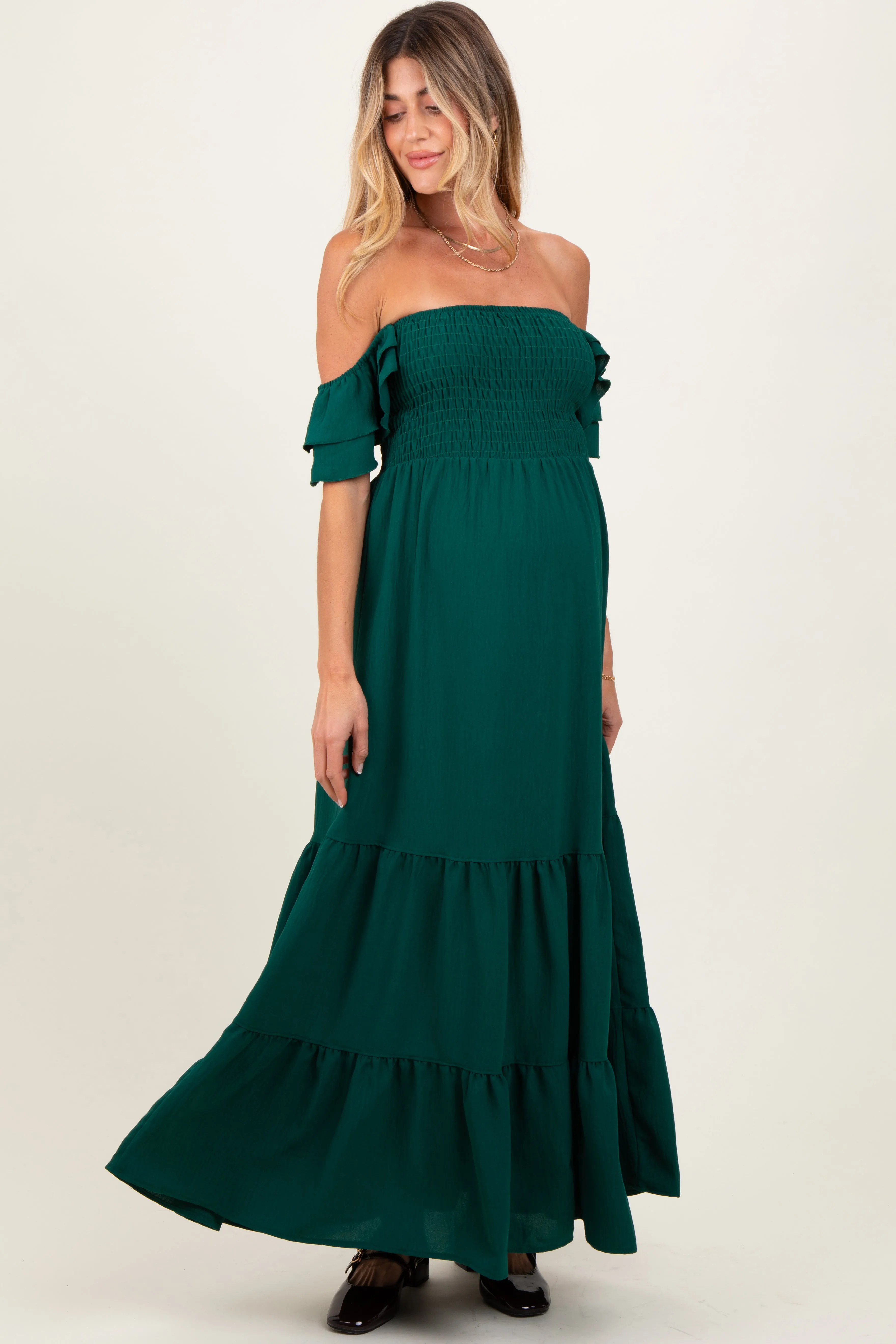 Hunter Green Smocked Ruffle Off Shoulder Tiered Maternity Maxi Dress sold by Pinkblush