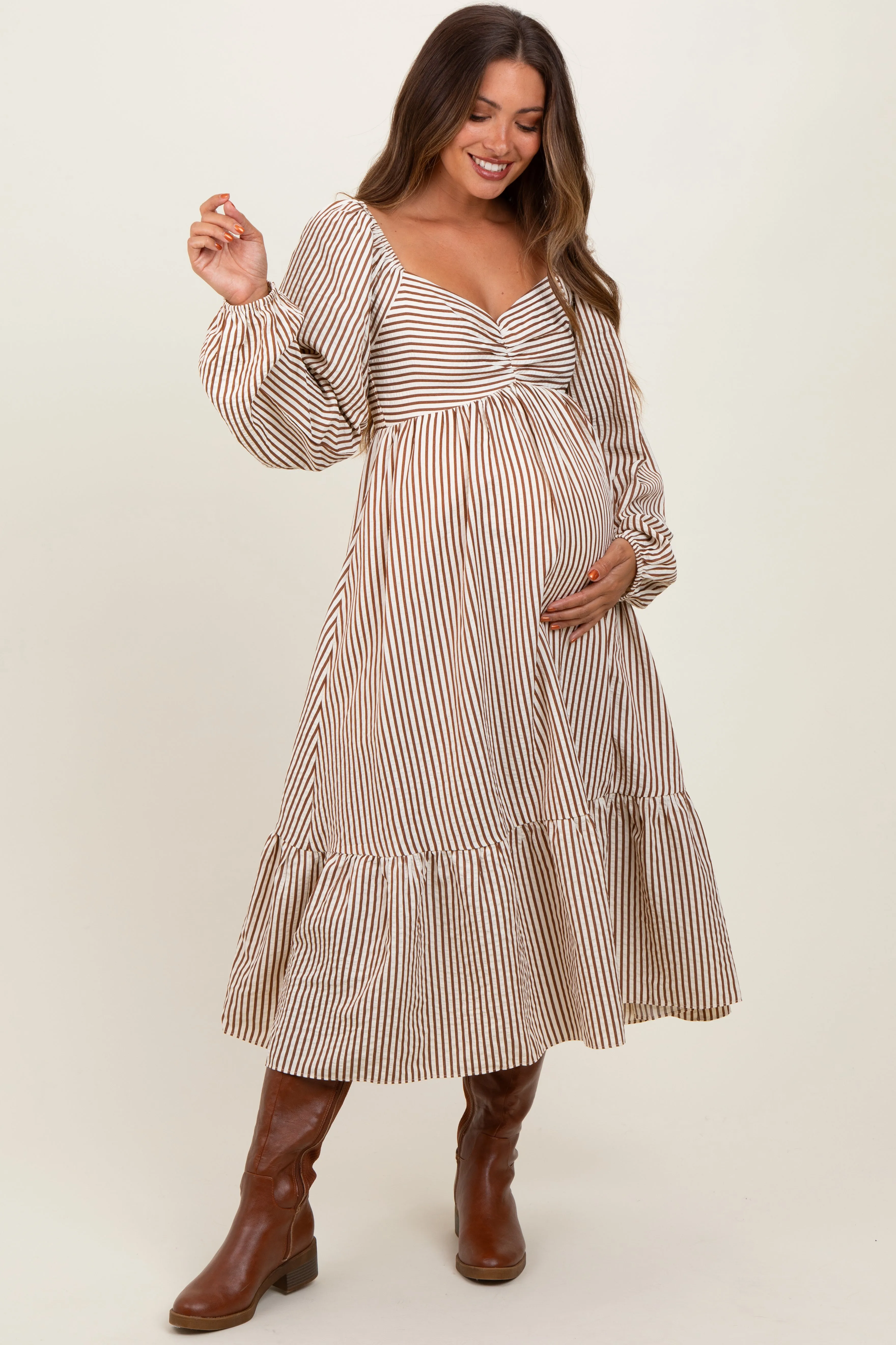 Brown Striped Ruched Bodice Balloon Sleeved Maternity Midi Dress sold by Pinkblush