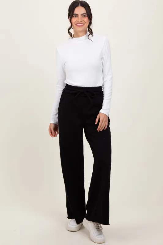Black Exposed Seam Wide Leg Sweatpants sold by Pinkblush