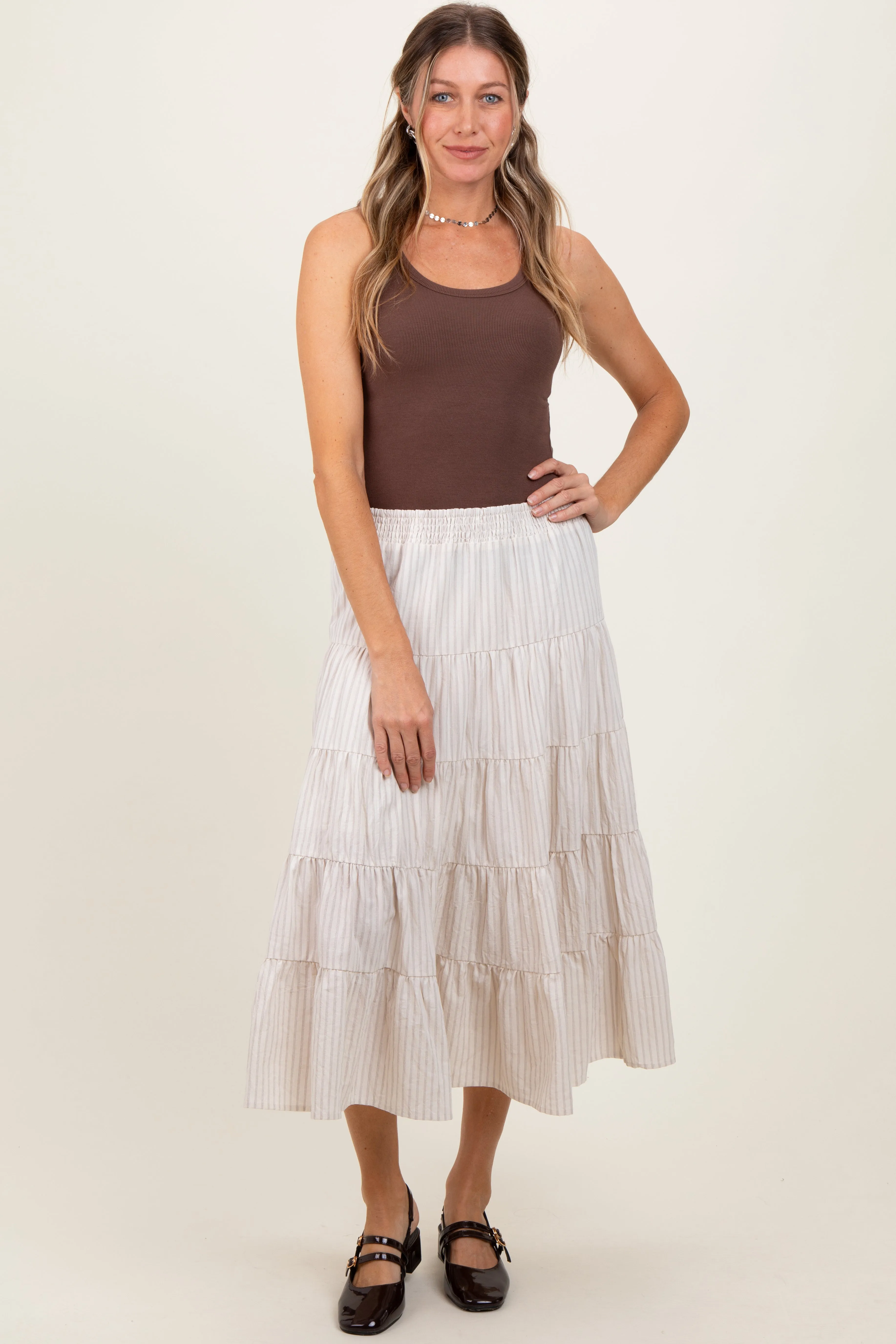 Ivory Striped Tiered Maxi Skirt sold by Pinkblush