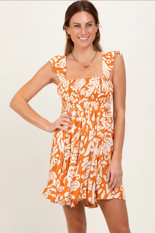 Orange Printed Smocked Ruffle Strap Dress sold by Pinkblush
