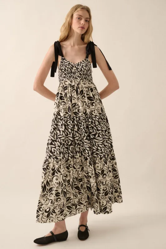 Black Leaf Print Smocked Shoulder Tie Tiered Maxi Dress sold by Pinkblush