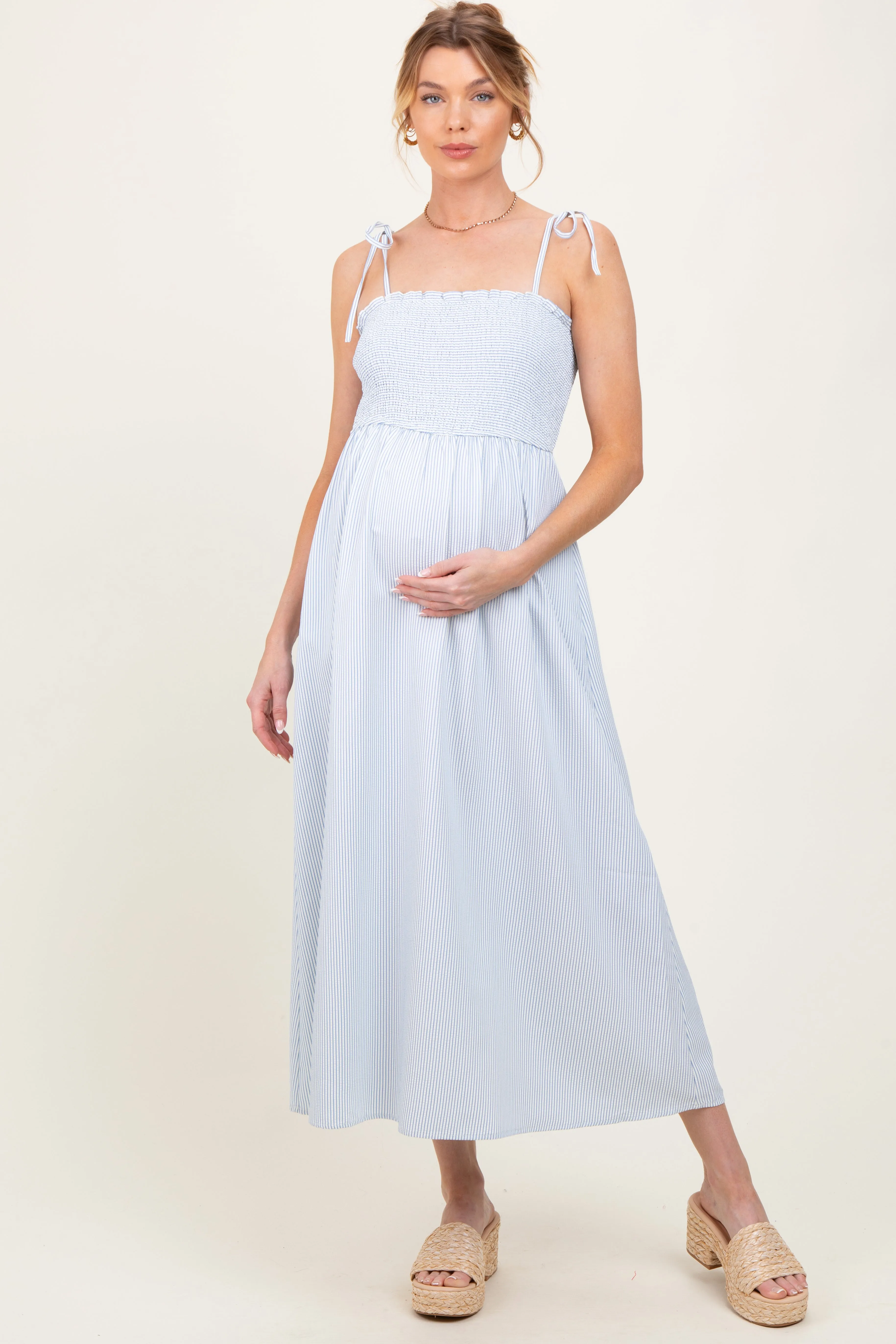 Blue Striped Shoulder Tie Smocked Maternity Maxi Dress sold by Pinkblush