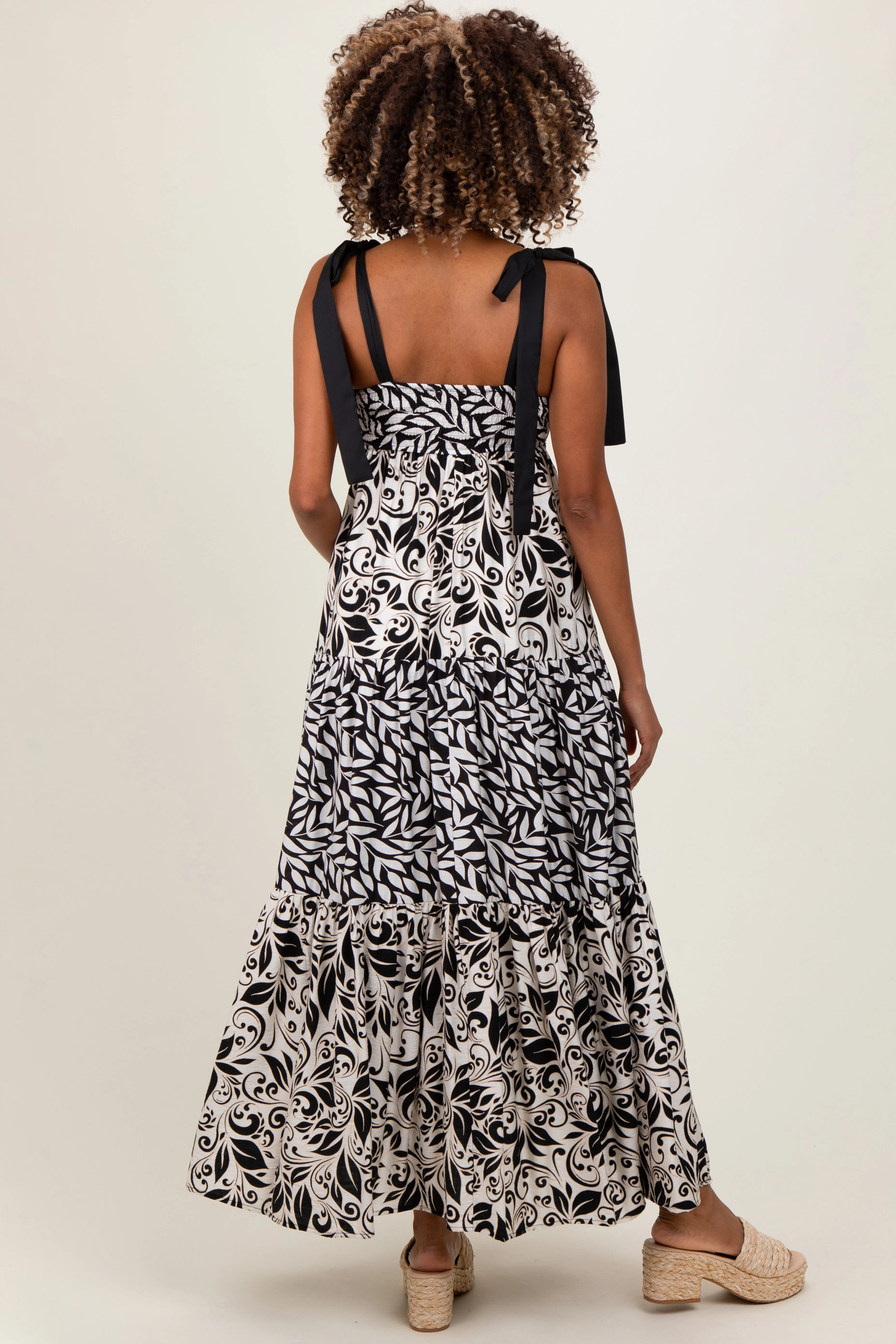 Black Leaf Print Smocked Shoulder Tie Tiered Maternity Maxi Dress sold by Pinkblush product image thumbnail 3