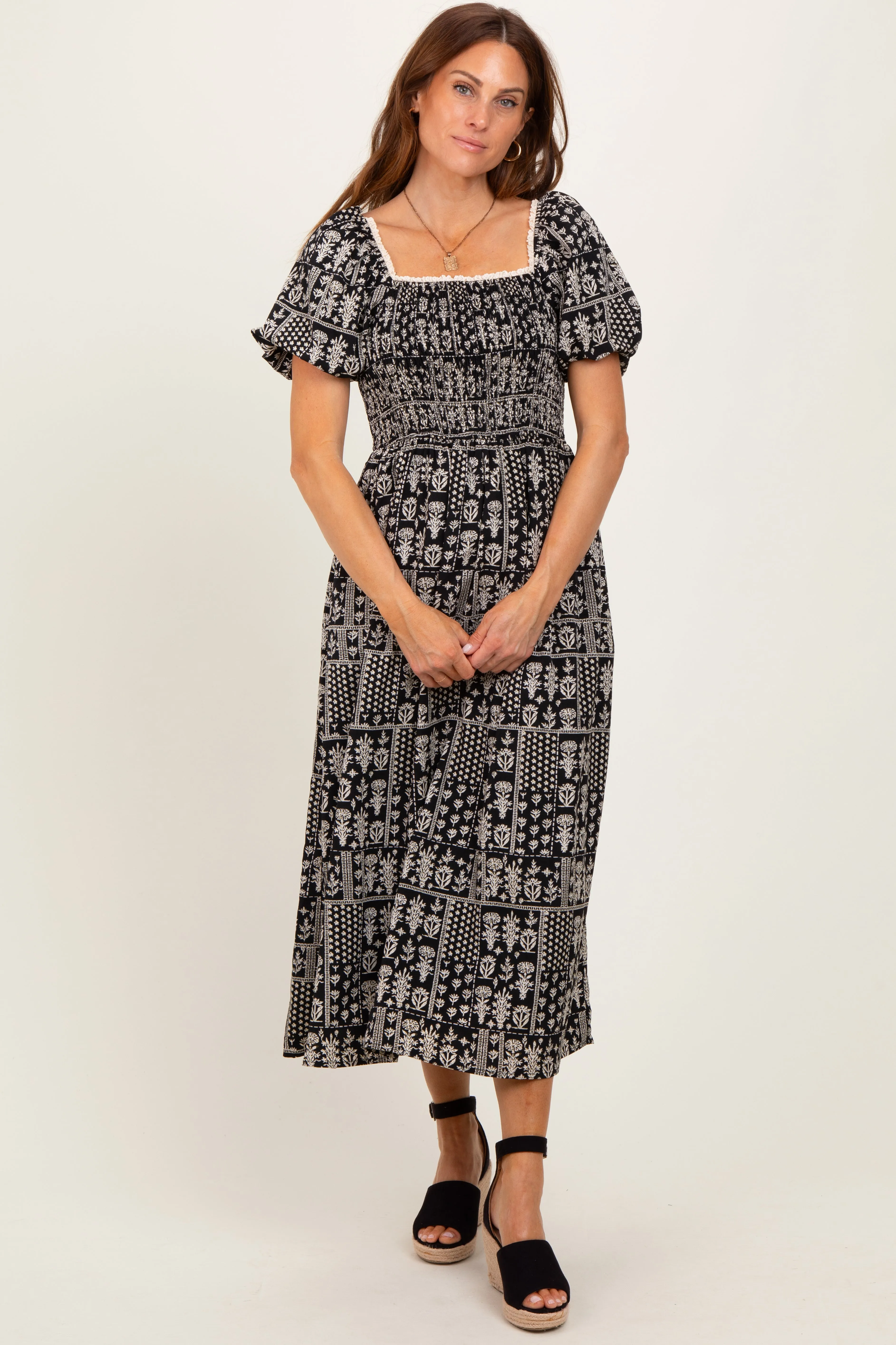 Black Patch Printed Smocked Midi Dress sold by Pinkblush