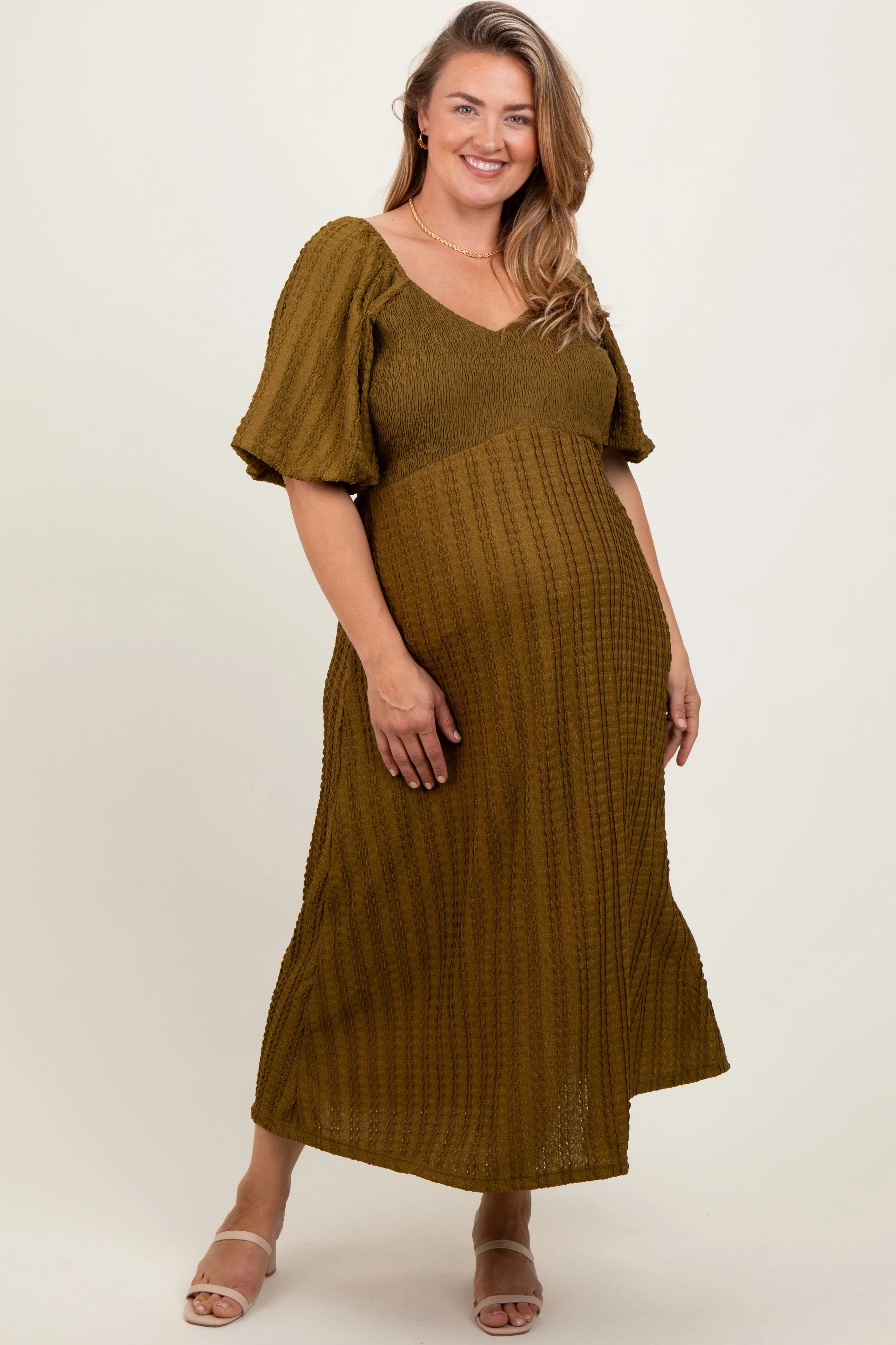 Olive Smocked V-Neck Short Puff Sleeve Textured Maternity Plus Midi Dress sold by Pinkblush