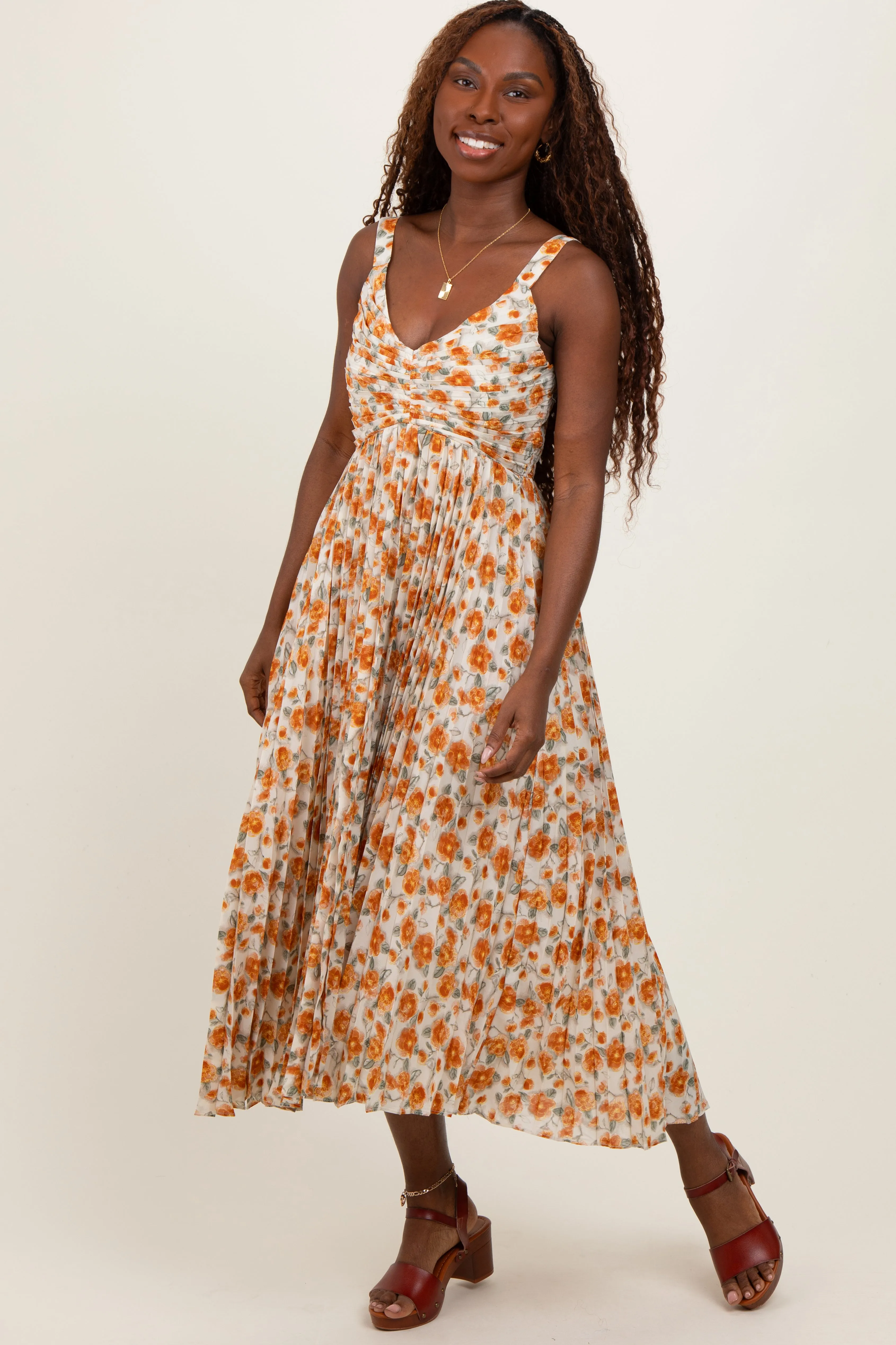 Peach Floral Pleated Midi Dress sold by Pinkblush