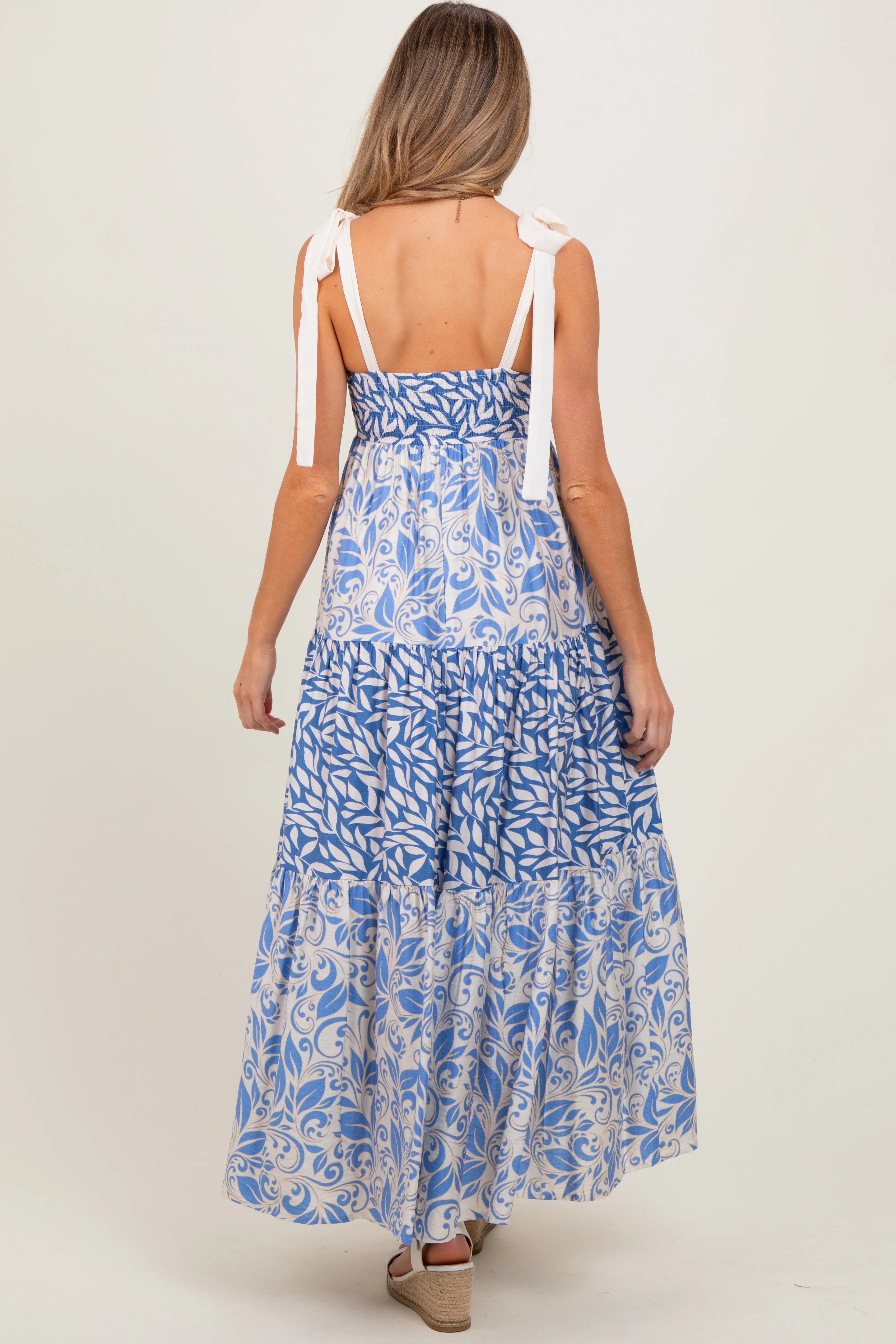 Blue Leaf Print Smocked Shoulder Tie Tiered Maternity Maxi Dress sold by Pinkblush product image thumbnail 4