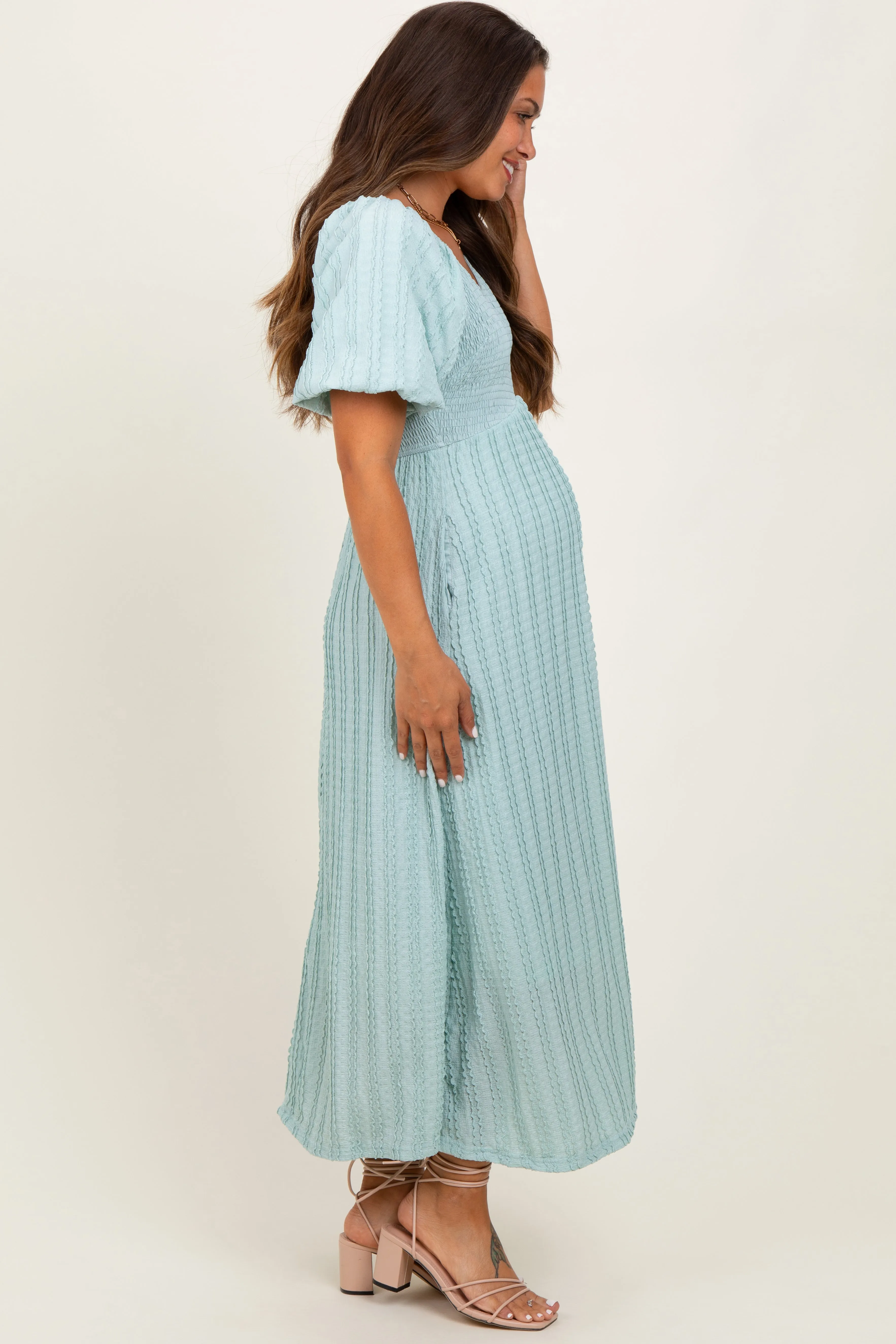 Mint Green Smocked V-Neck Short Puff Sleeve Textured Maternity Midi Dress sold by Pinkblush product image thumbnail 3