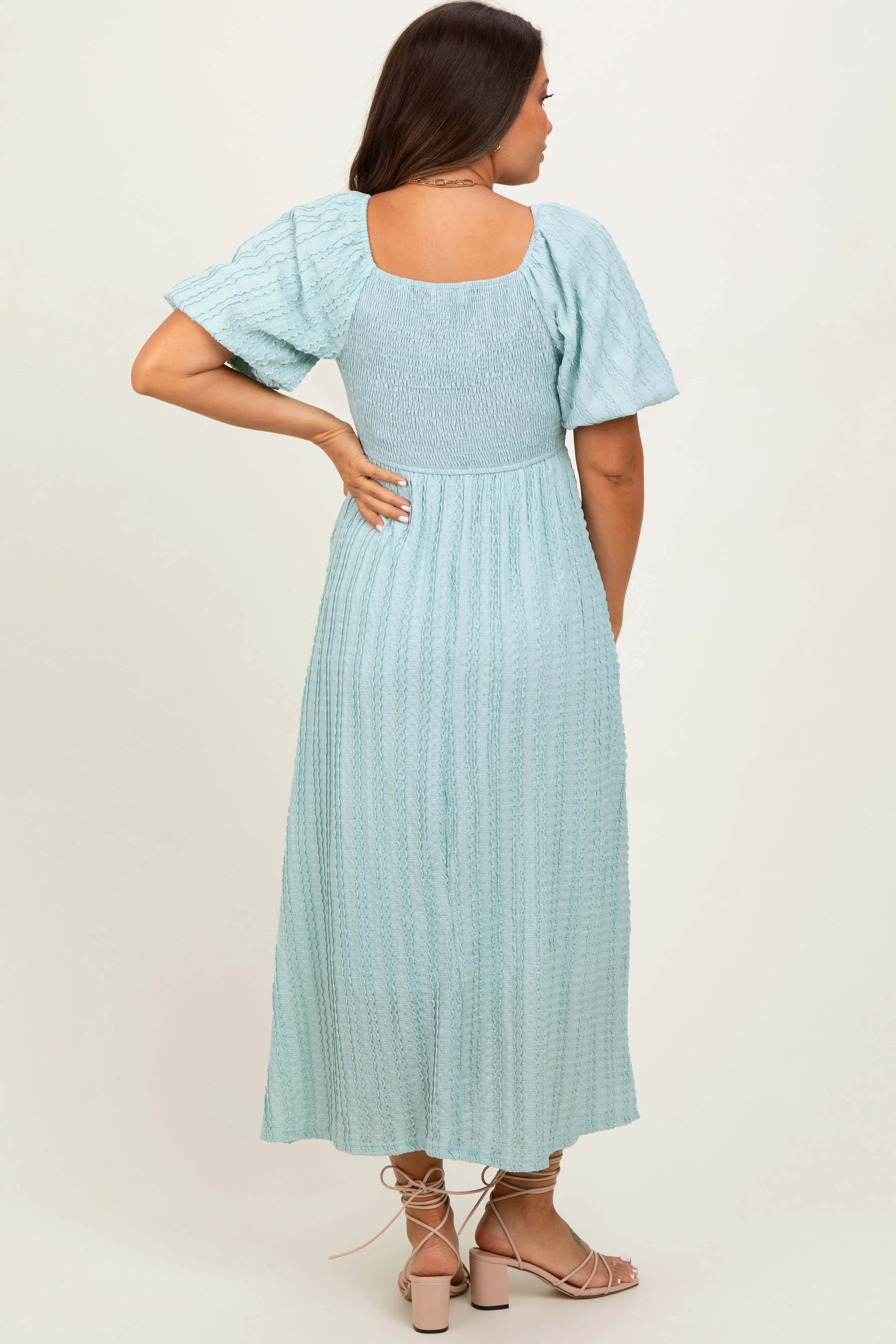 Mint Green Smocked V-Neck Short Puff Sleeve Textured Maternity Midi Dress sold by Pinkblush product image thumbnail 4