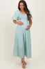 Mint Green Smocked V-Neck Short Puff Sleeve Textured Maternity Midi Dress sold by Pinkblush