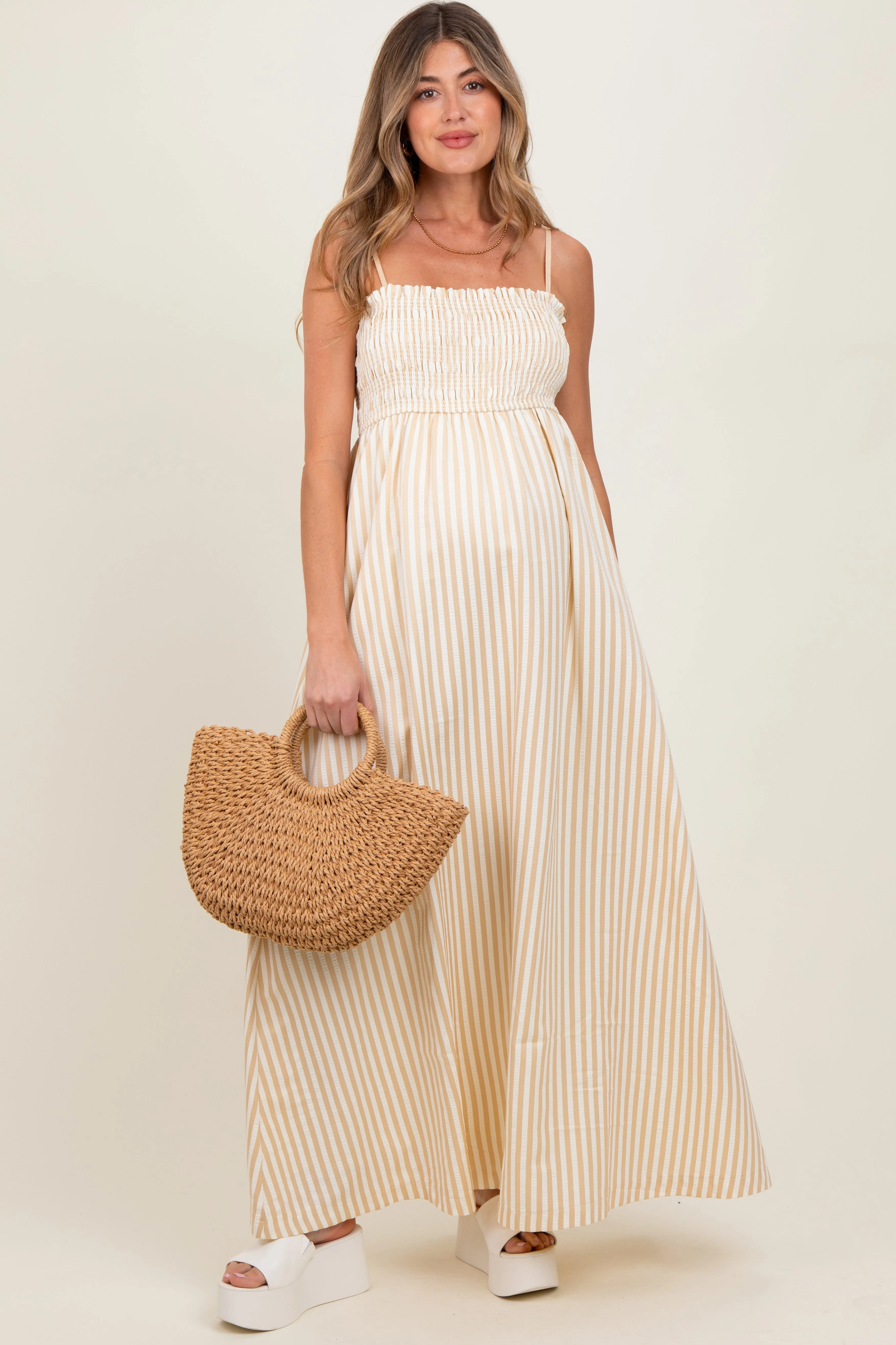Beige Striped Sleeveless Smocked Poplin Maternity Maxi Dress sold by Pinkblush